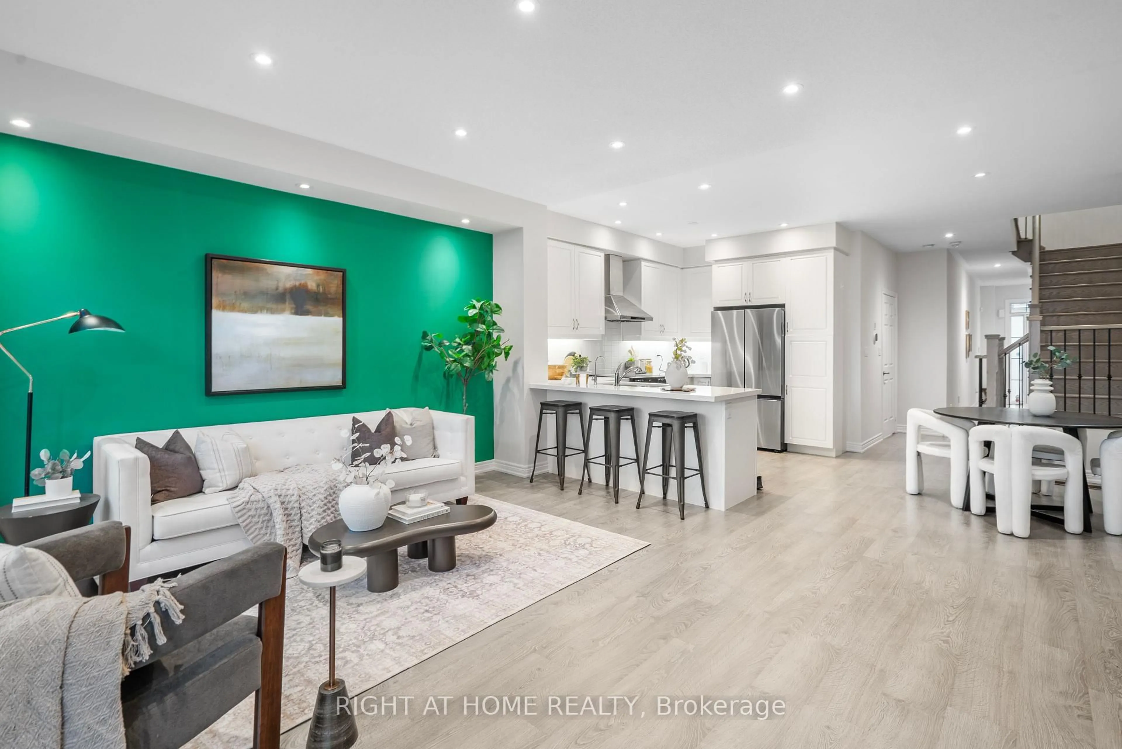 Open concept kitchen, wood/laminate floor for 127 Benadir Ave, Caledon Ontario L7C 4E7