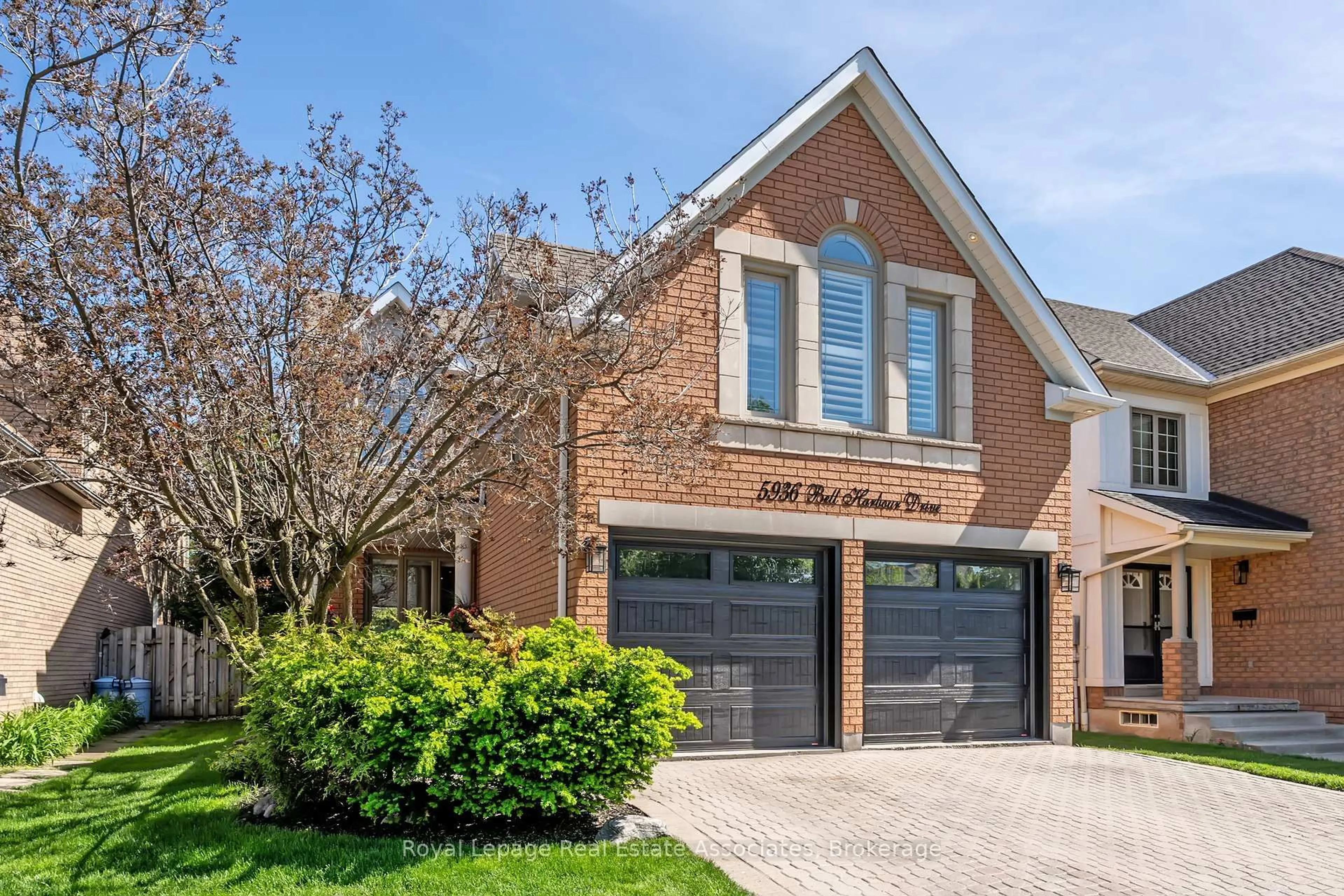 Home with brick exterior material, street for 5936 Bell Harbour Dr, Mississauga Ontario L5M 5K7