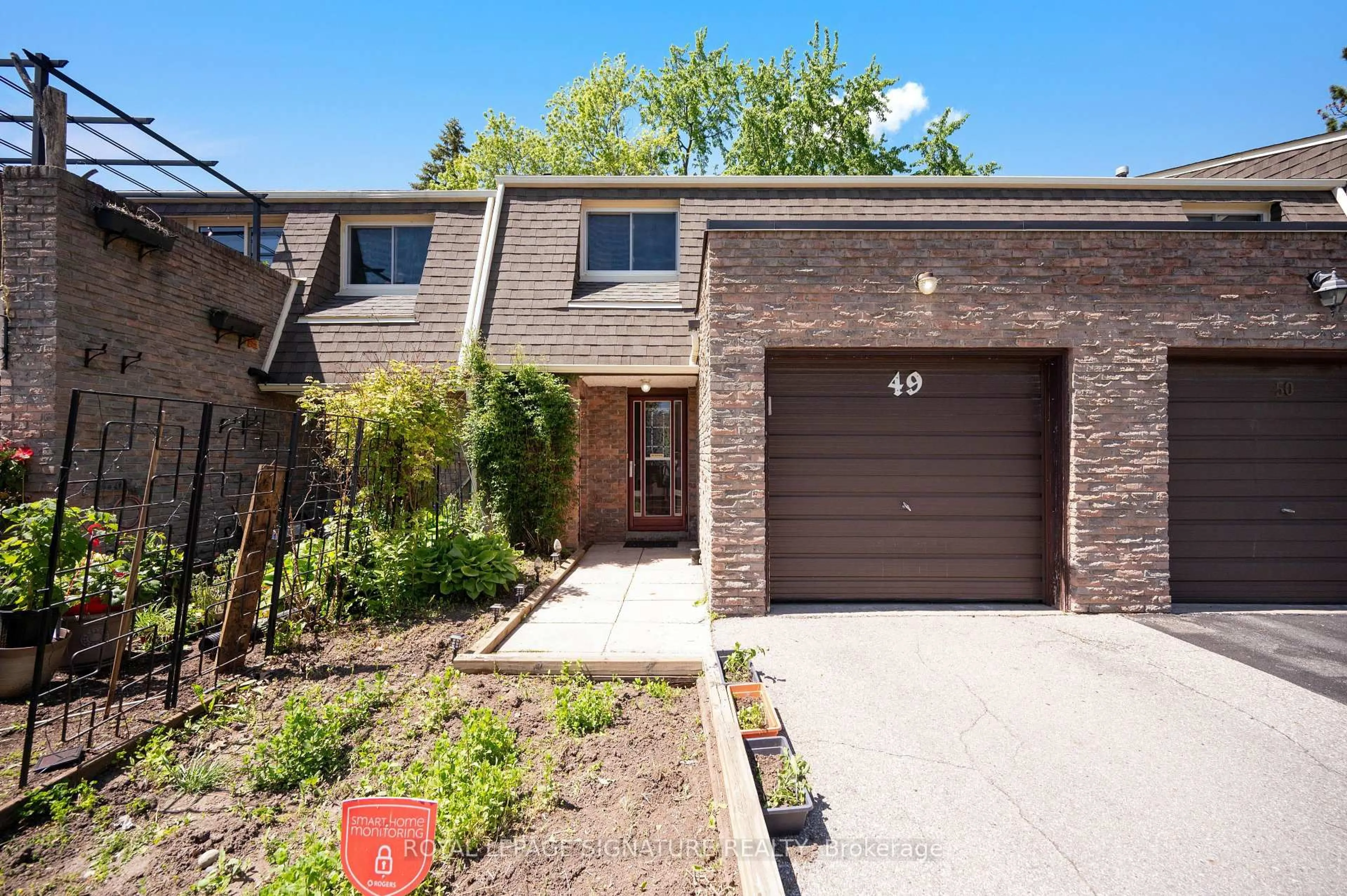 Home with brick exterior material, street for 7430 Copenhagen Rd #49, Mississauga Ontario L5N 1Z9