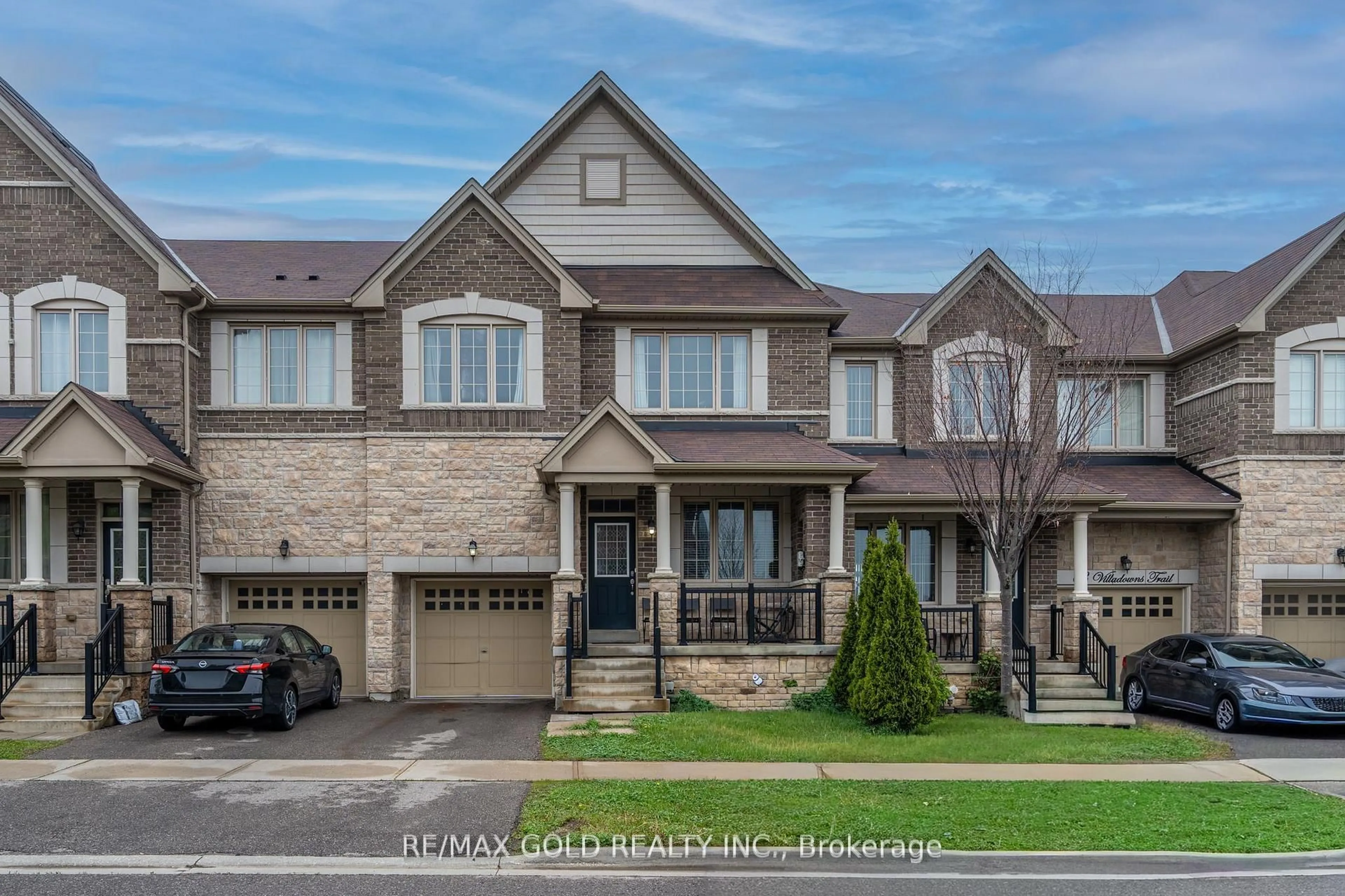 Home with brick exterior material, street for 65 Villadowns Tr, Brampton Ontario L6R 3Y8