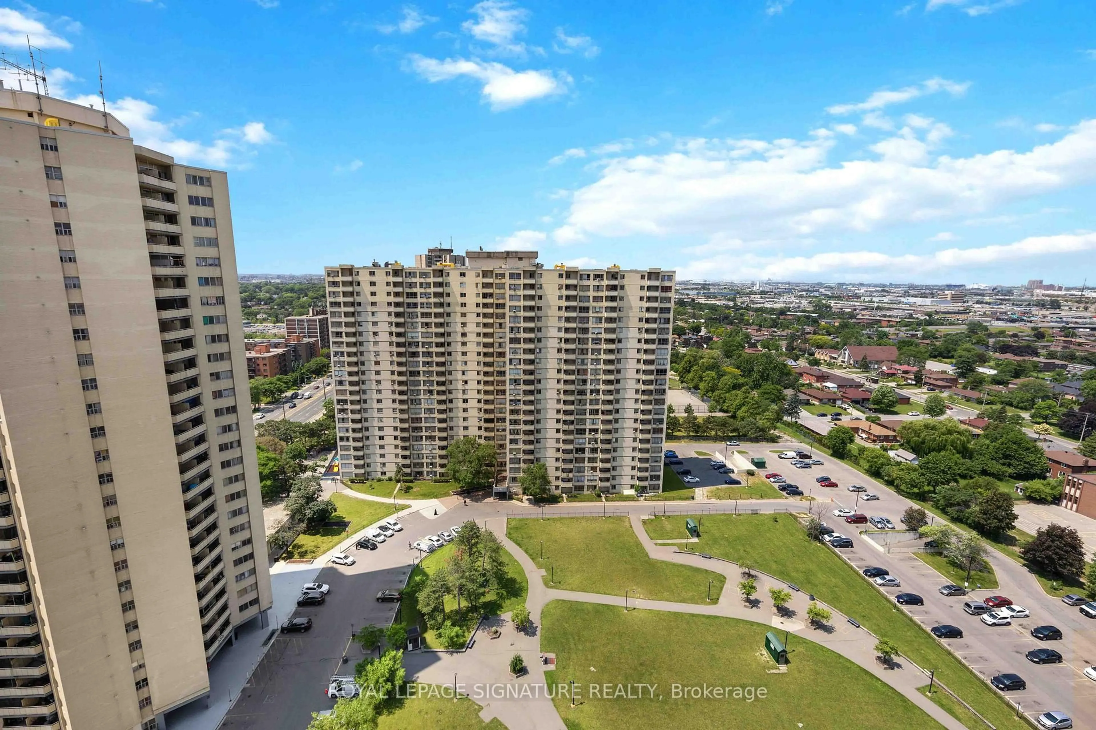 A pic from outside/outdoor area/front of a property/back of a property/a pic from drone, city buildings view from balcony for 320 Dixon Rd #2315, Toronto Ontario M9R 1S8