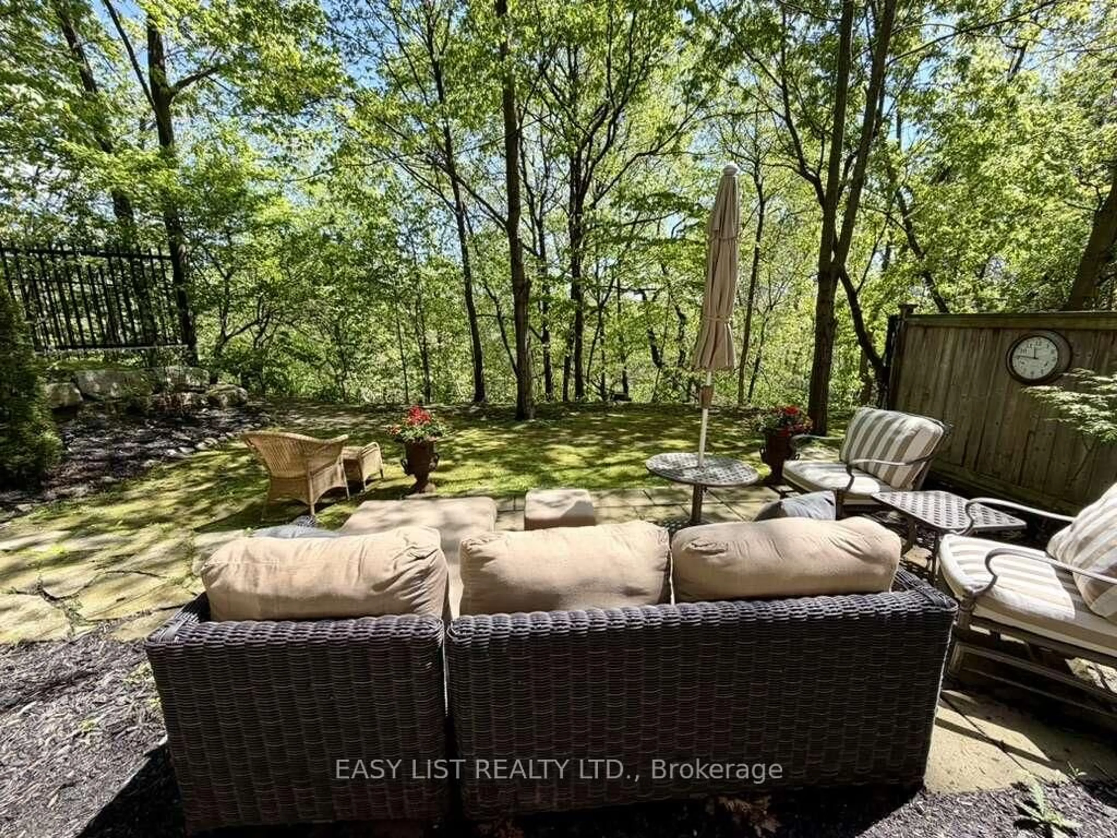 Patio, forest/trees view for 245 Dalesford Rd #B8, Toronto Ontario M8Y 4H7