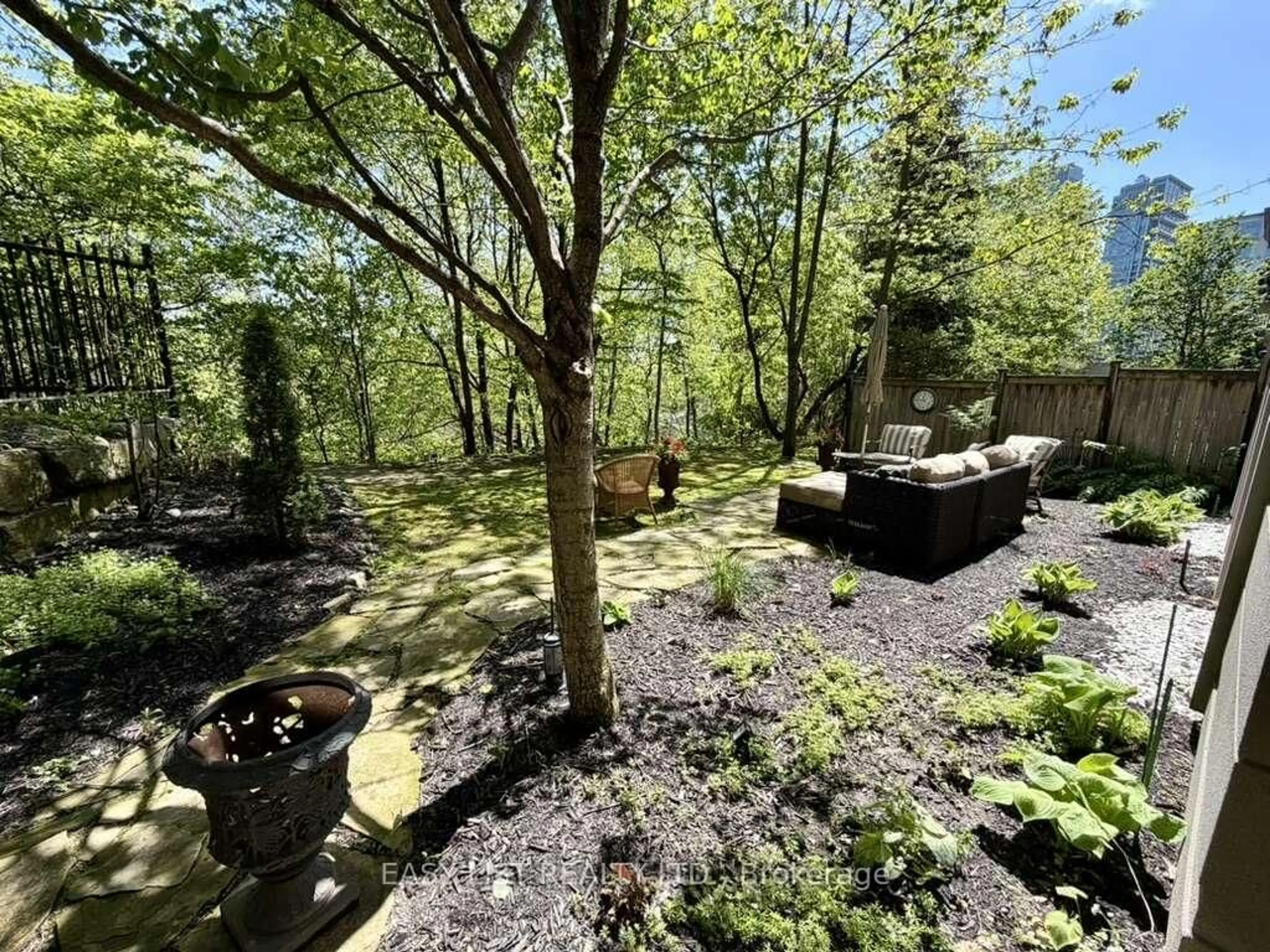 Patio, forest/trees view for 245 Dalesford Rd #B8, Toronto Ontario M8Y 4H7