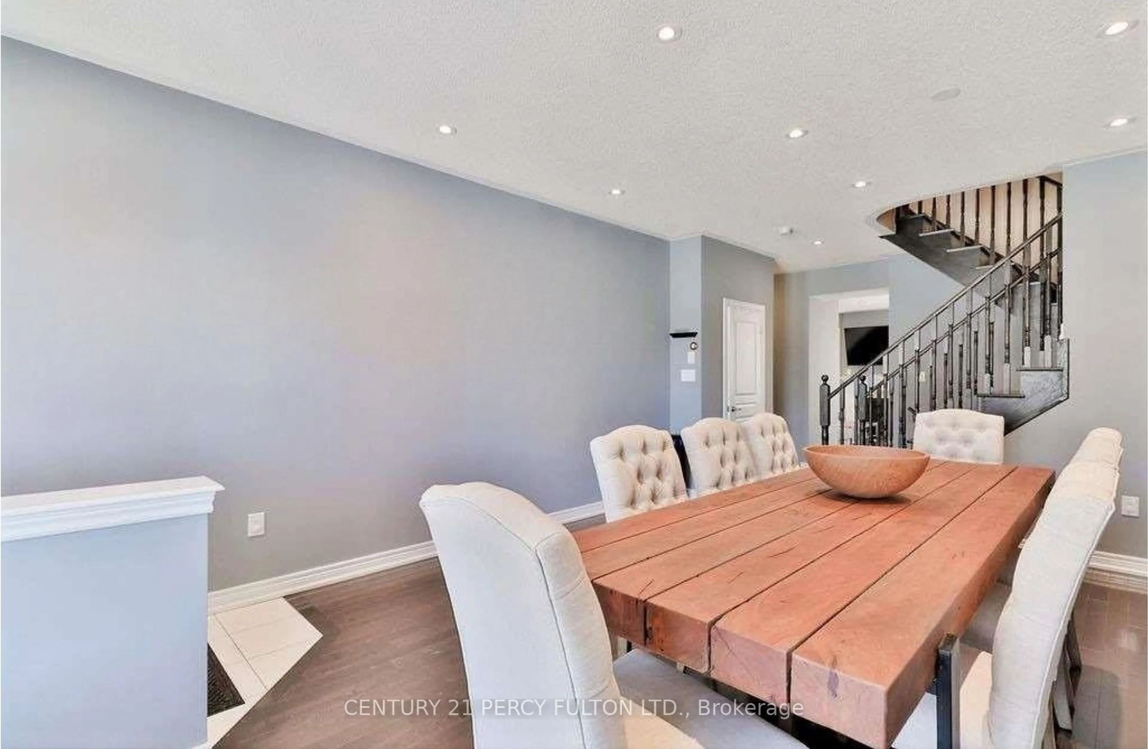 Dining room, wood/laminate floor for 115 Bonnie Braes Dr, Brampton Ontario L6Y 0Z5