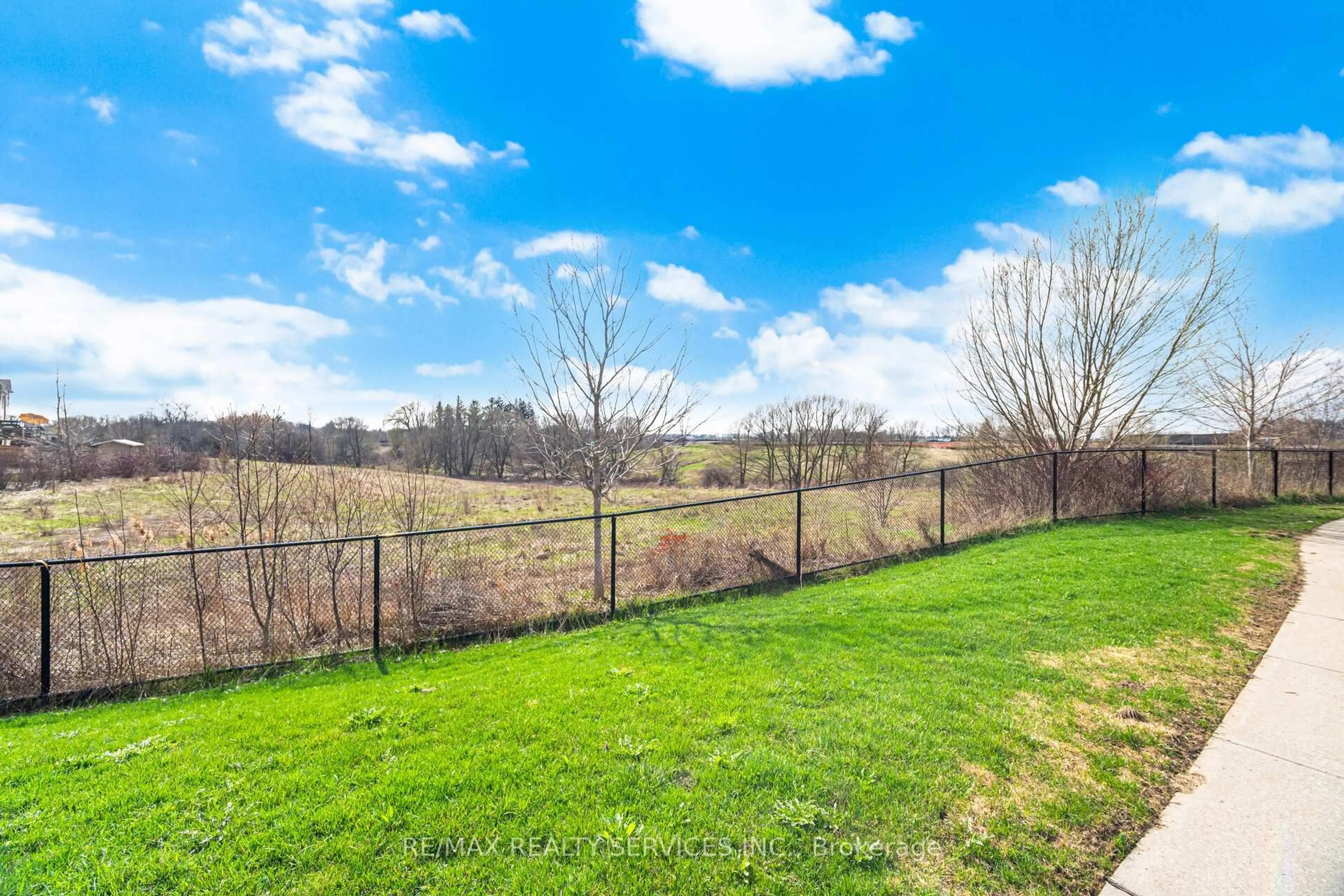 A pic from outside/outdoor area/front of a property/back of a property/a pic from drone, water/lake/river/ocean view for 38 Blackberry Valley Cres, Caledon Ontario L7C 3Z9