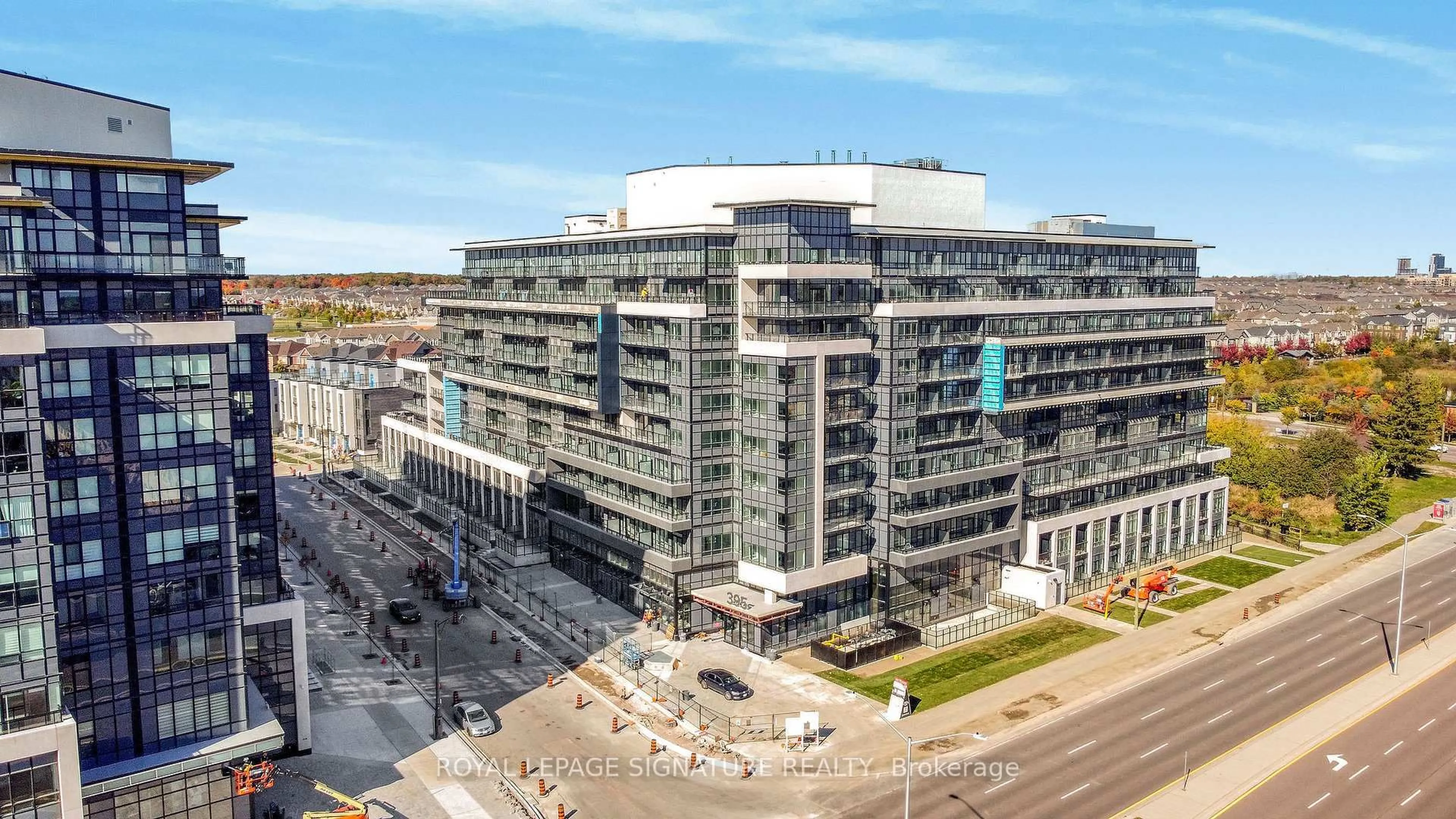 A pic from outside/outdoor area/front of a property/back of a property/a pic from drone, city buildings view from balcony for 395 Dundas St #234, Oakville Ontario L6M 5R8