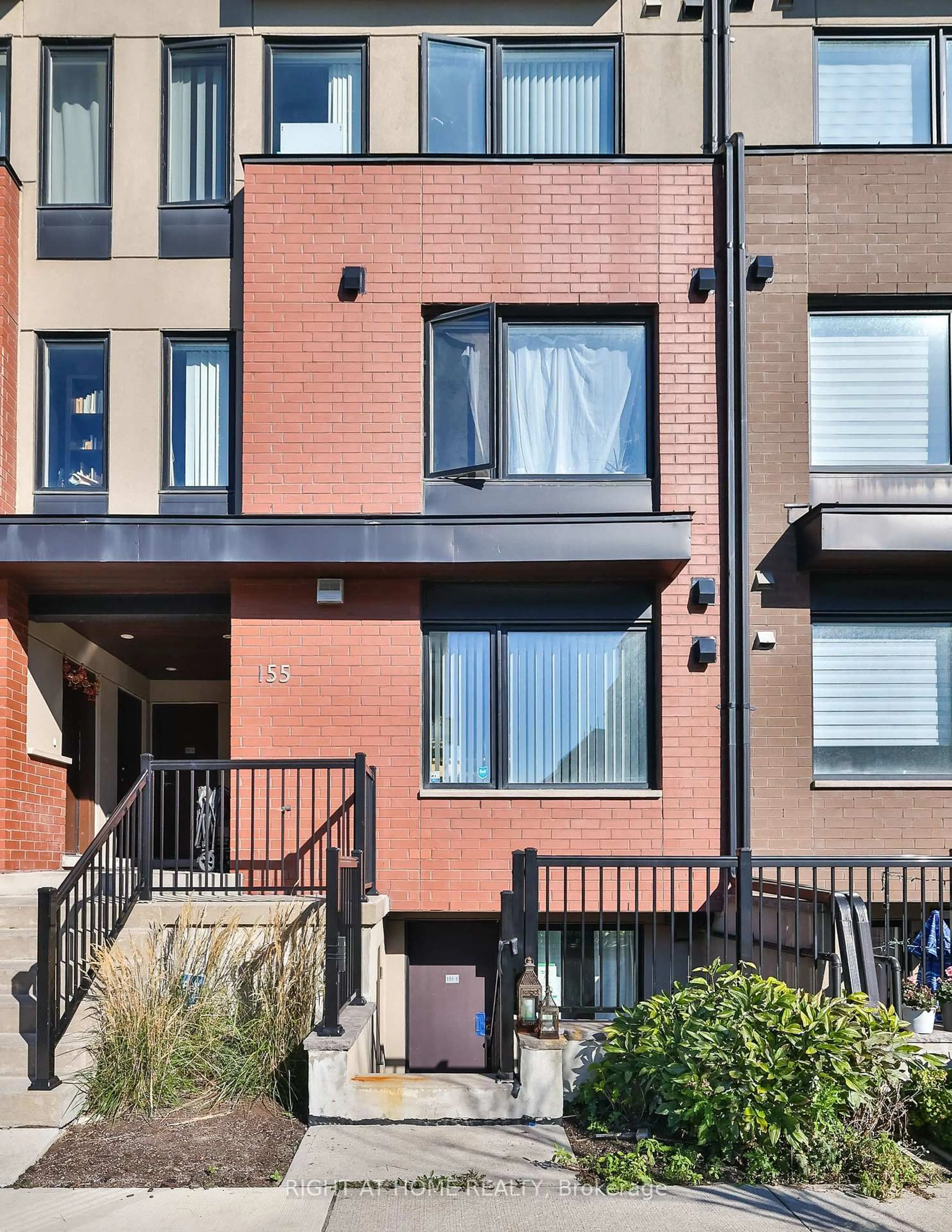 Home with brick exterior material, street for 155 William Duncan Rd #5, Toronto Ontario M3K 0B9