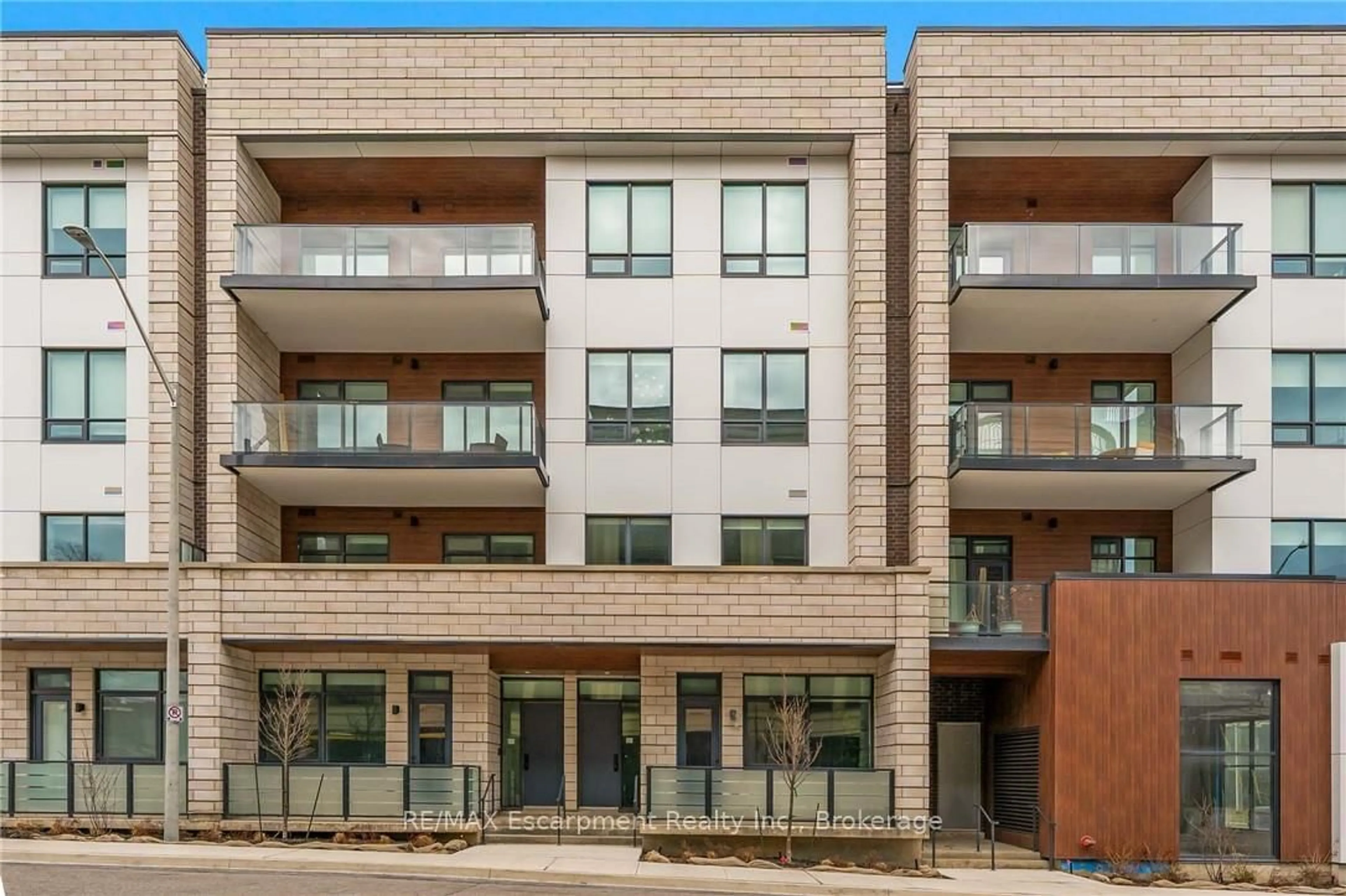 Home with brick exterior material, building for 123 Maurice Dr #303, Oakville Ontario L6K 2W6