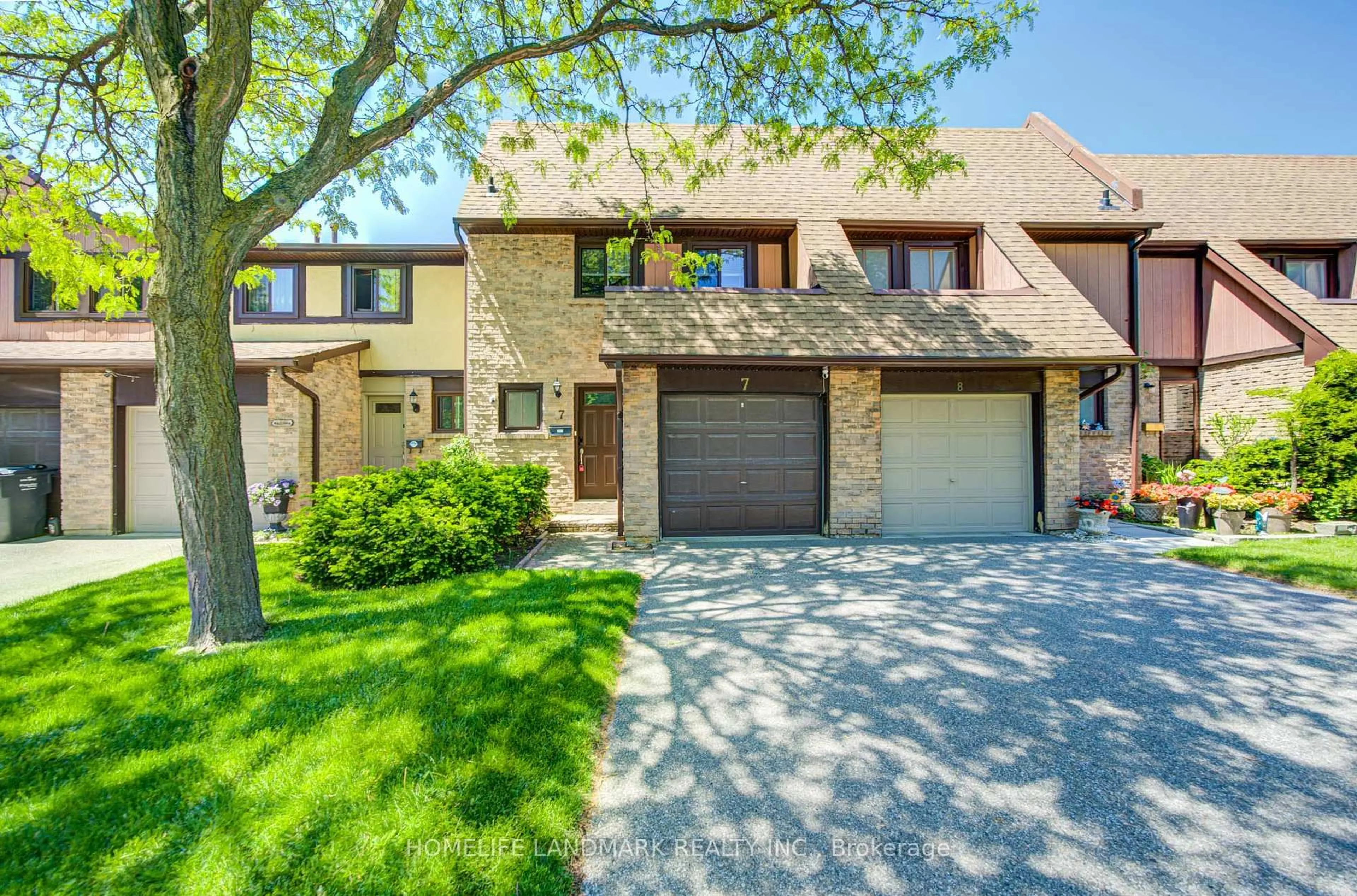 Home with brick exterior material, street for 3345 Silverado Dr #7, Mississauga Ontario L5A 3Y8