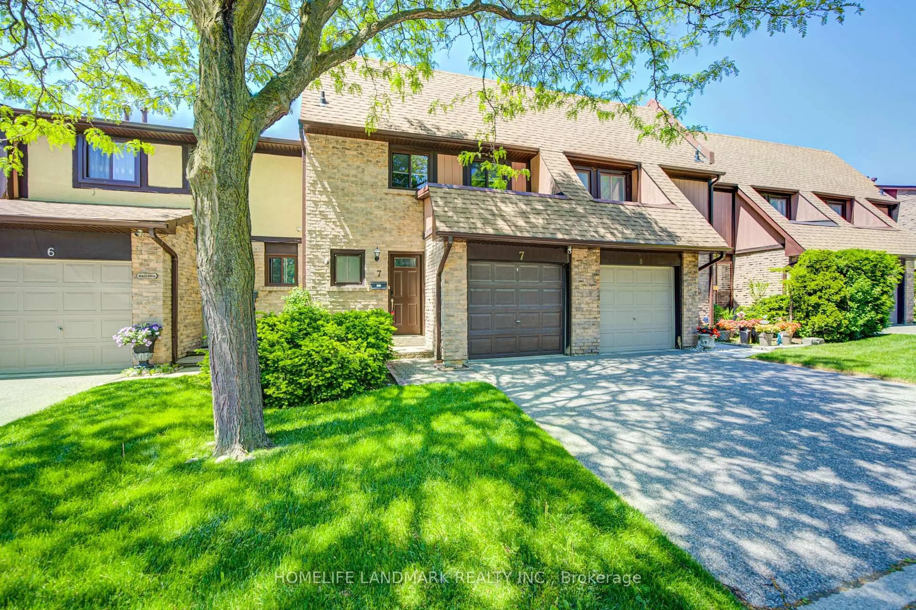 Home with brick exterior material, street for 3345 Silverado Dr #7, Mississauga Ontario L5A 3Y8