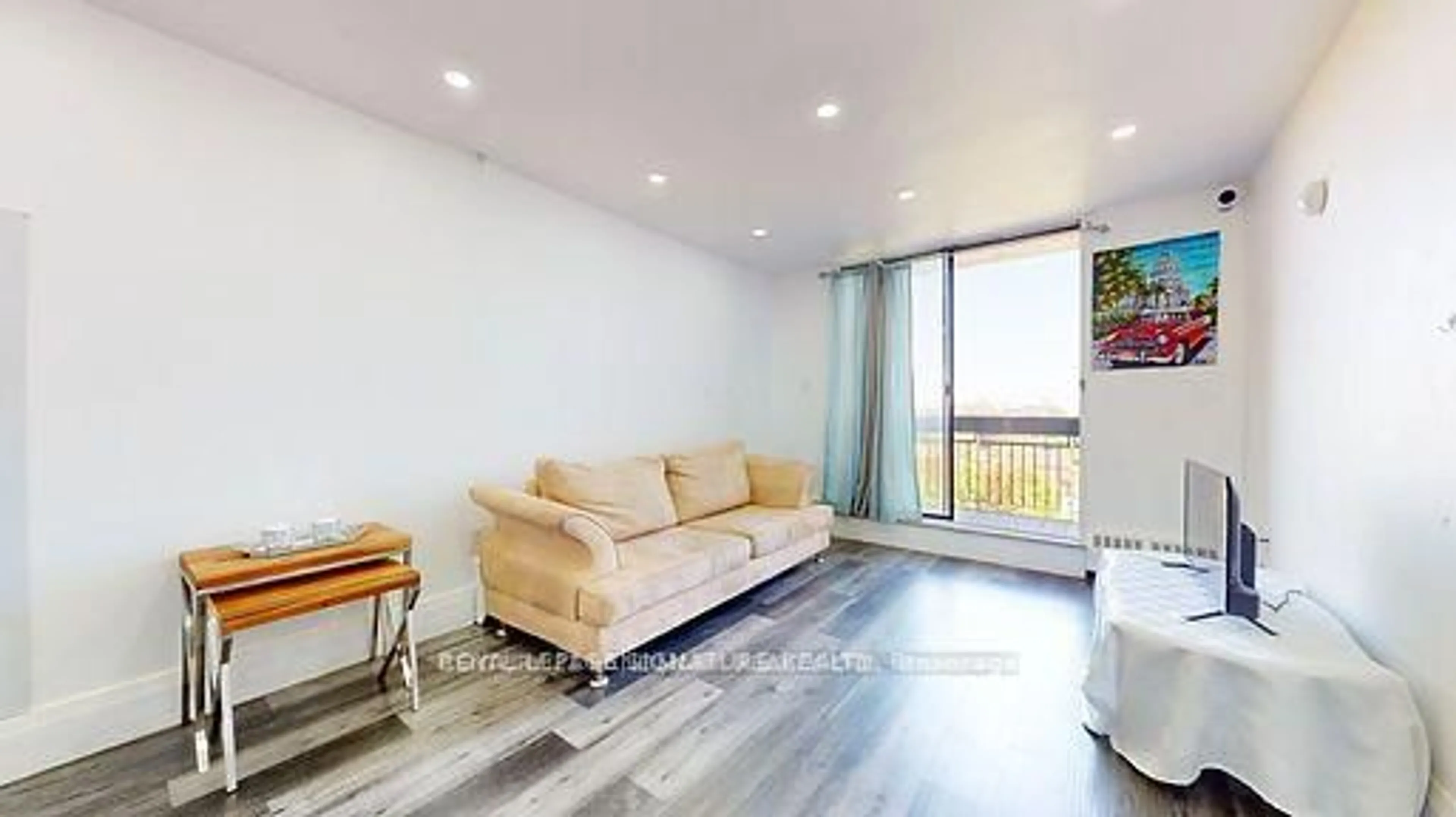 Living room with furniture, wood/laminate floor for 4673 Jane St #806, Toronto Ontario M3N 2L1