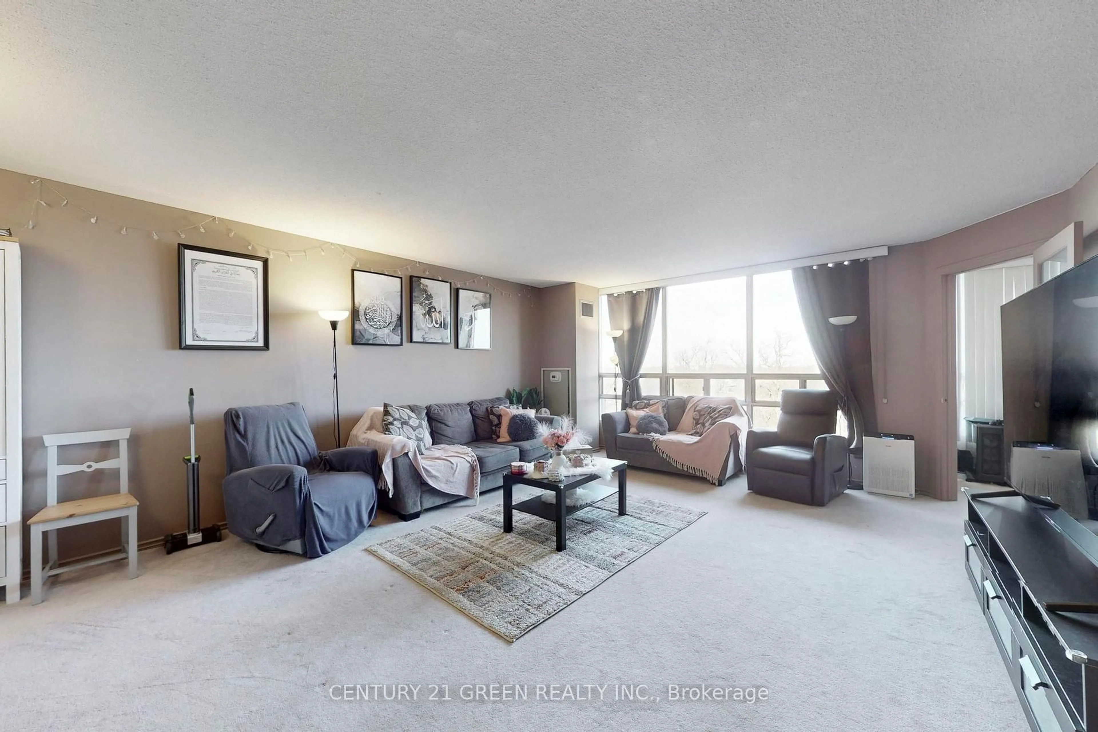 Living room with furniture, unknown for 310 Mill St #712, Brampton Ontario L6Y 3B1