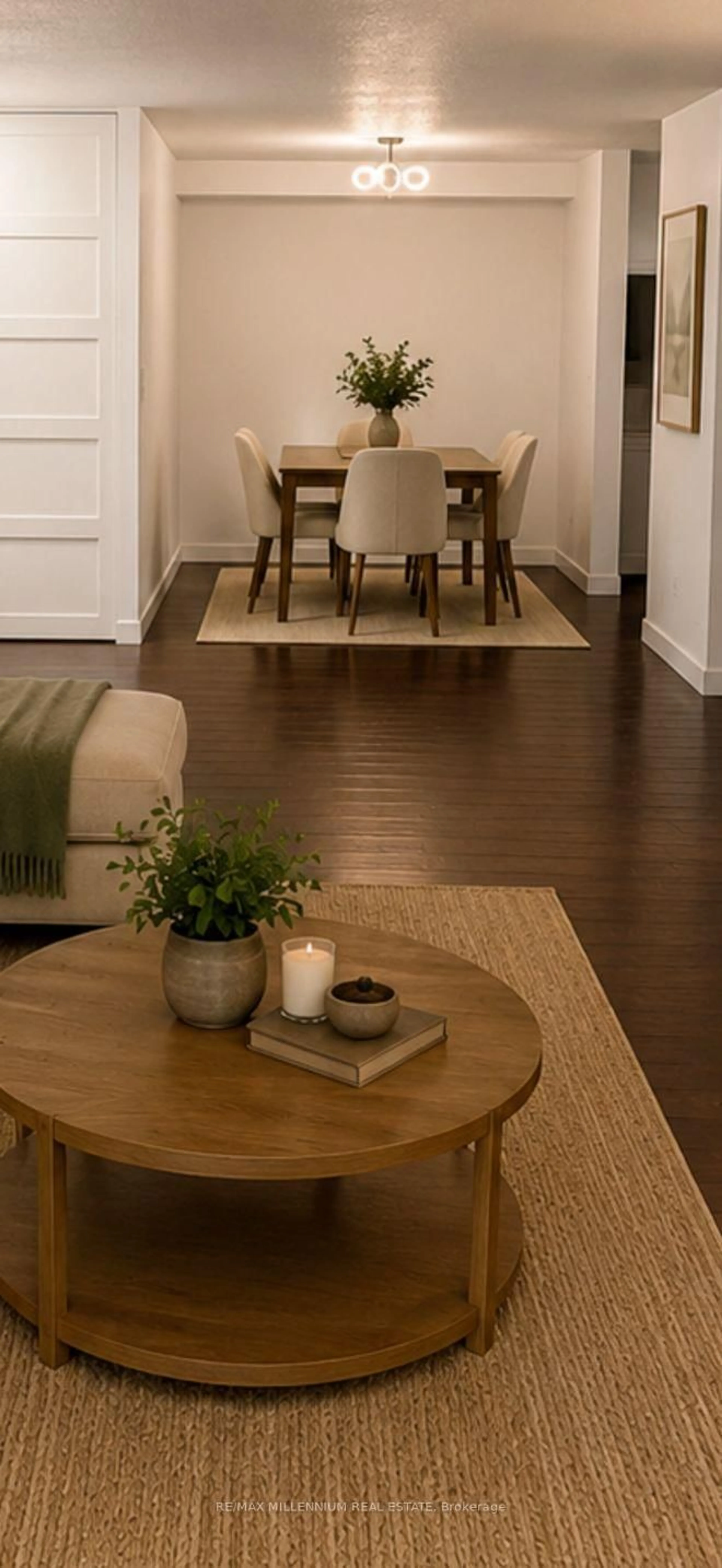 Living room with furniture, wood/laminate floor for 1480 Pilgrims Way #1613, Oakville Ontario L6M 3G7