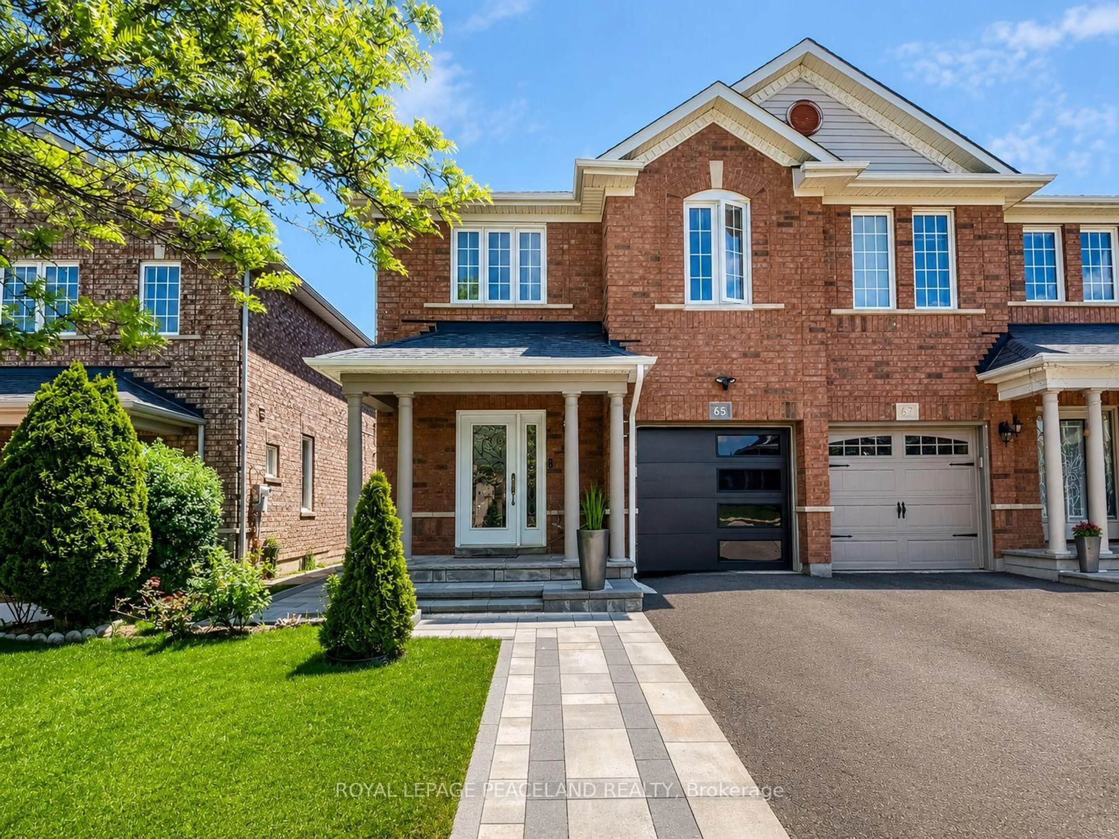 Home with brick exterior material, street for 65 Tanglemere Cres, Brampton Ontario L7A 1R9