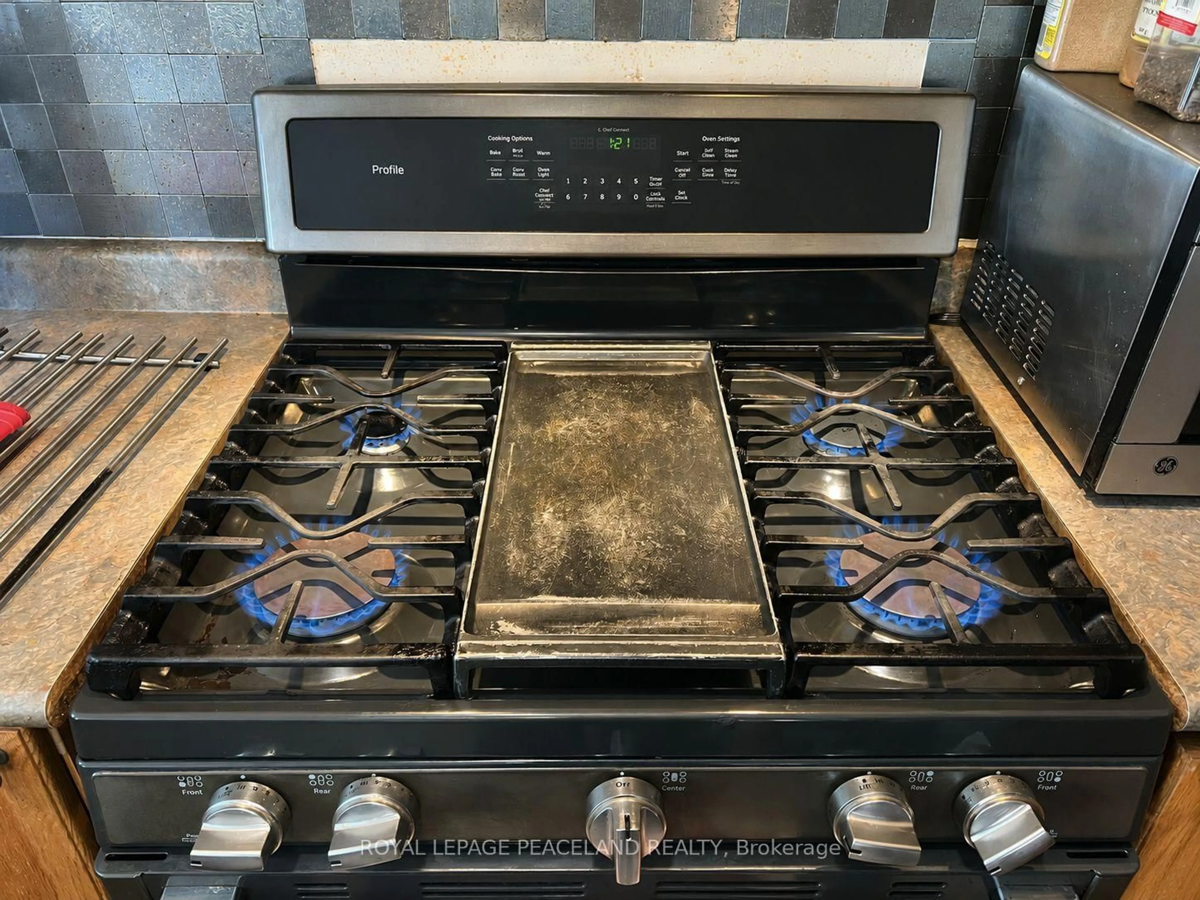 Standard kitchen, ceramic/tile floor for 65 Tanglemere Cres, Brampton Ontario L7A 1R9