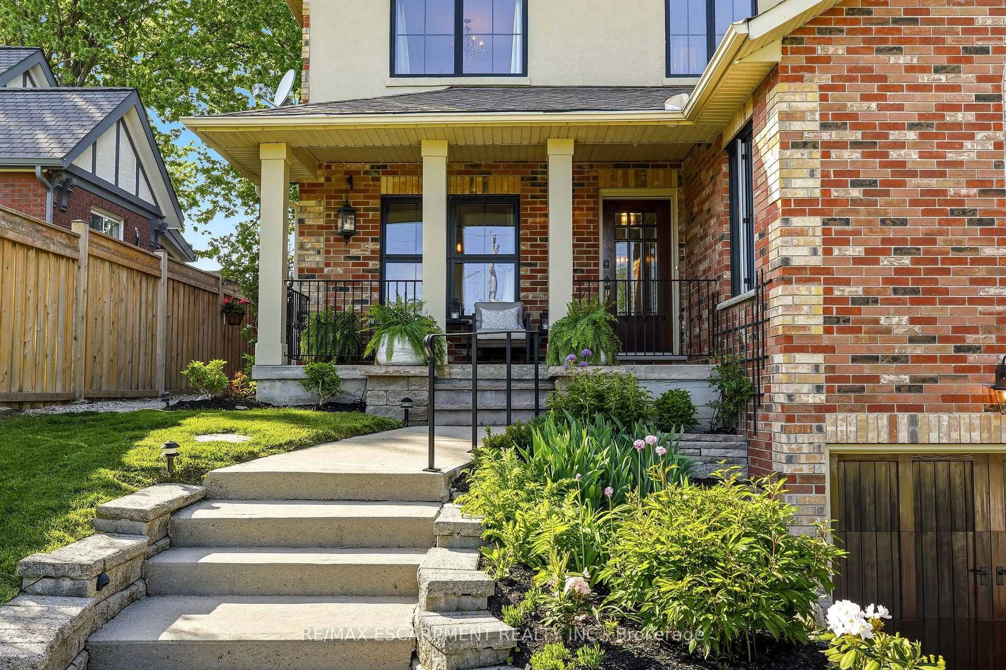 Home with brick exterior material, street for 329 Plains Rd, Burlington Ontario L7T 1G1