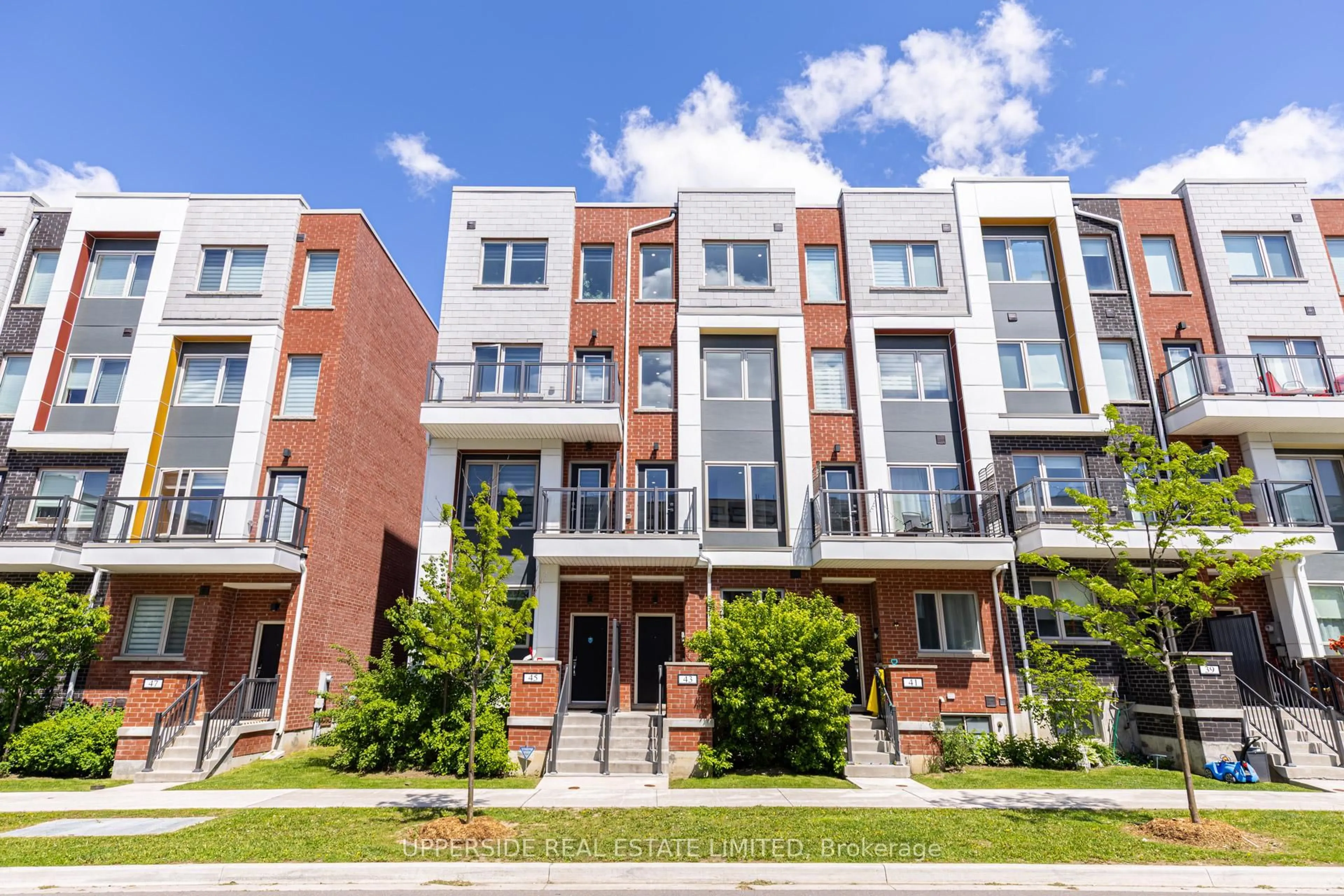 Home with brick exterior material, street for 43 Frederick Tisdale Dr, Toronto Ontario M3K 2B8