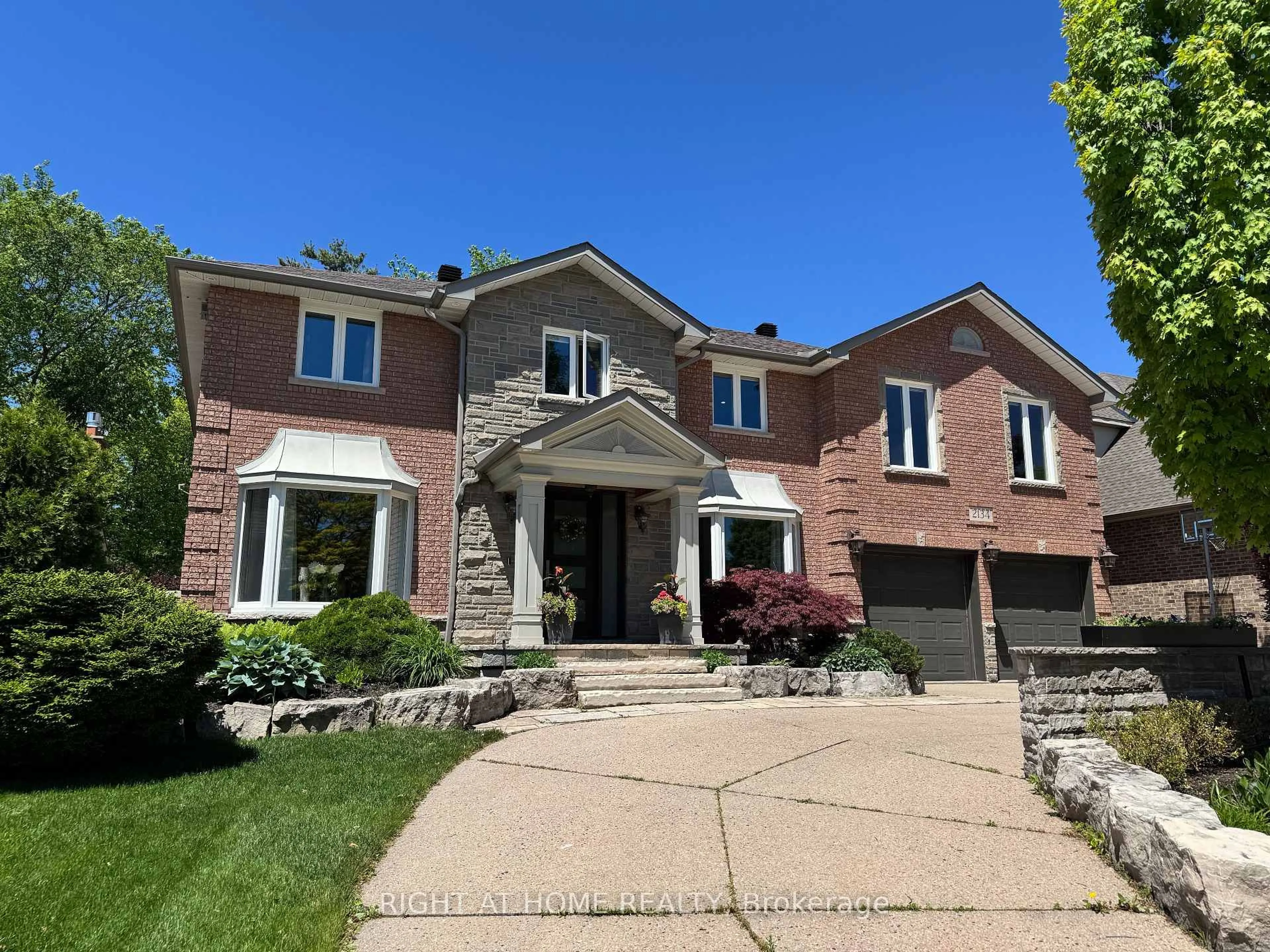 Home with brick exterior material, street for 2134 Grenville Dr, Oakville Ontario L6H 3Y6