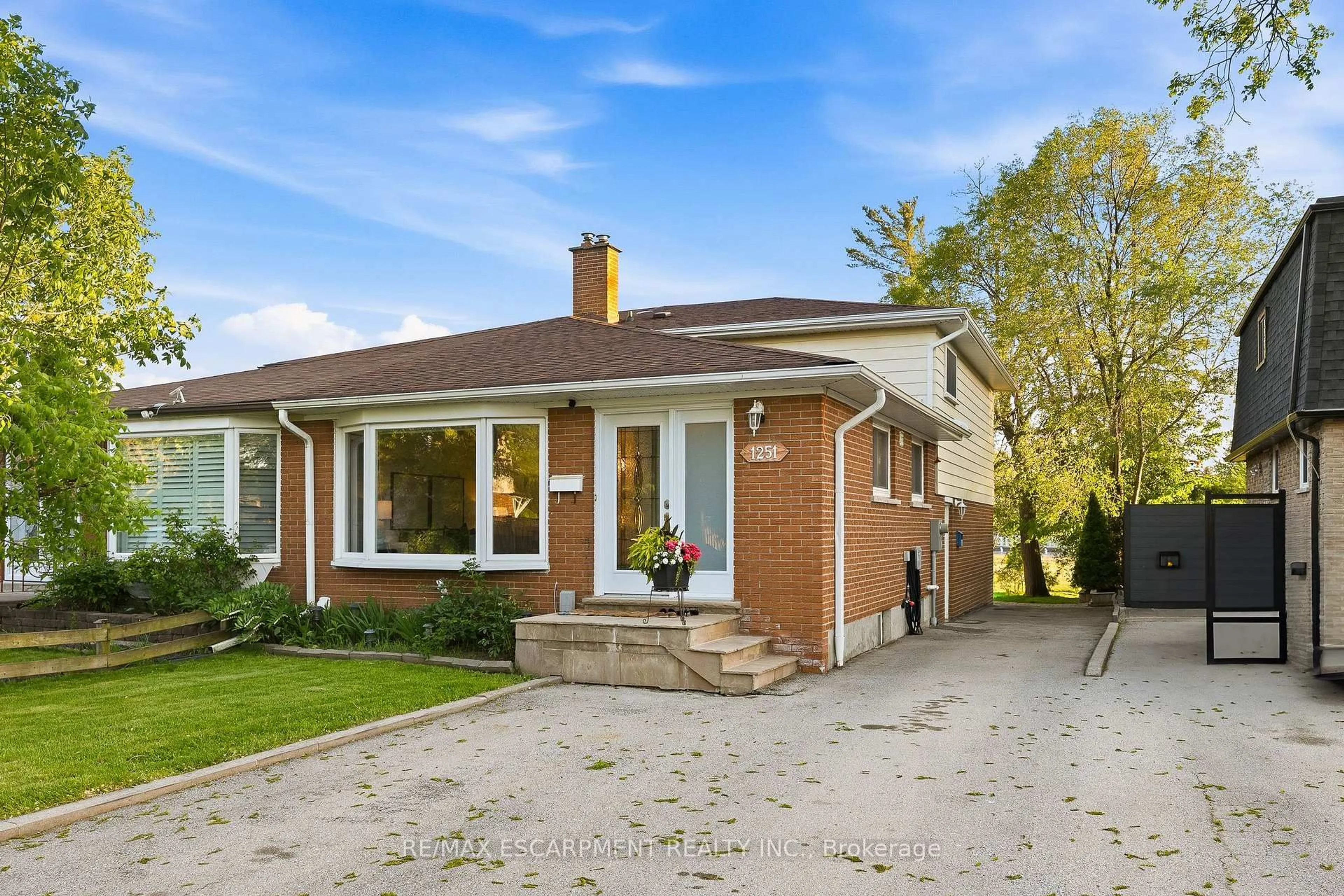 Home with brick exterior material, street for 1251 Fairdale Dr, Mississauga Ontario L5C 1K3