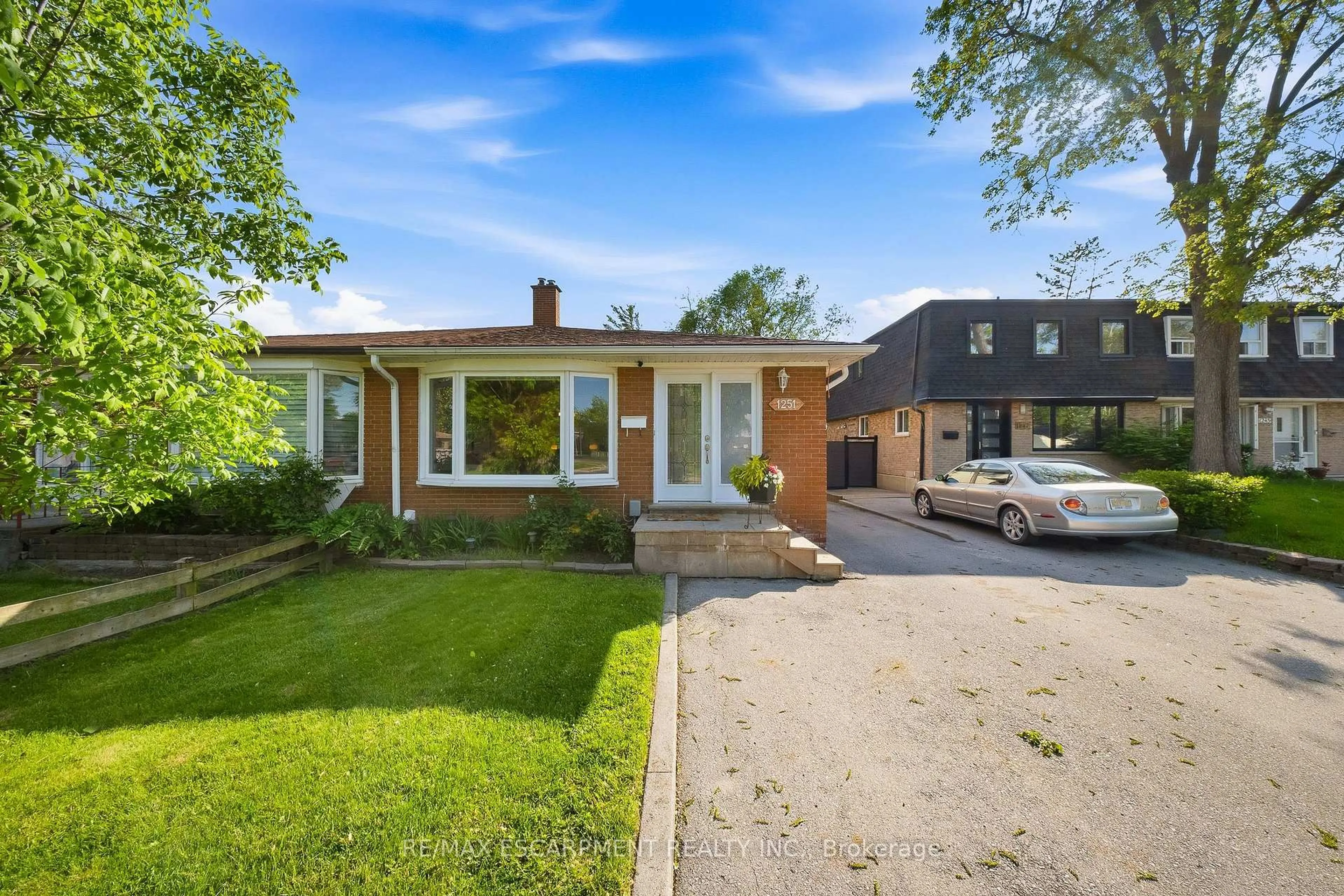 Home with brick exterior material, street for 1251 Fairdale Dr, Mississauga Ontario L5C 1K3