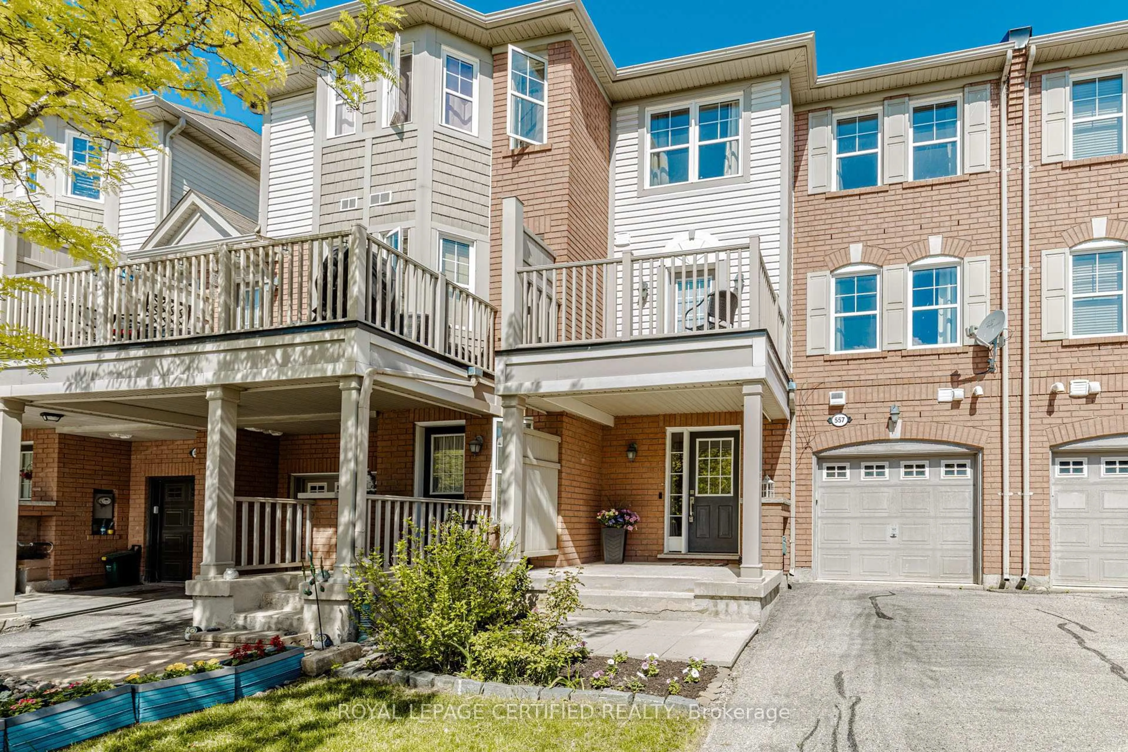 Home with brick exterior material, street for 557 Speyer Circ, Milton Ontario L9T 0Y1