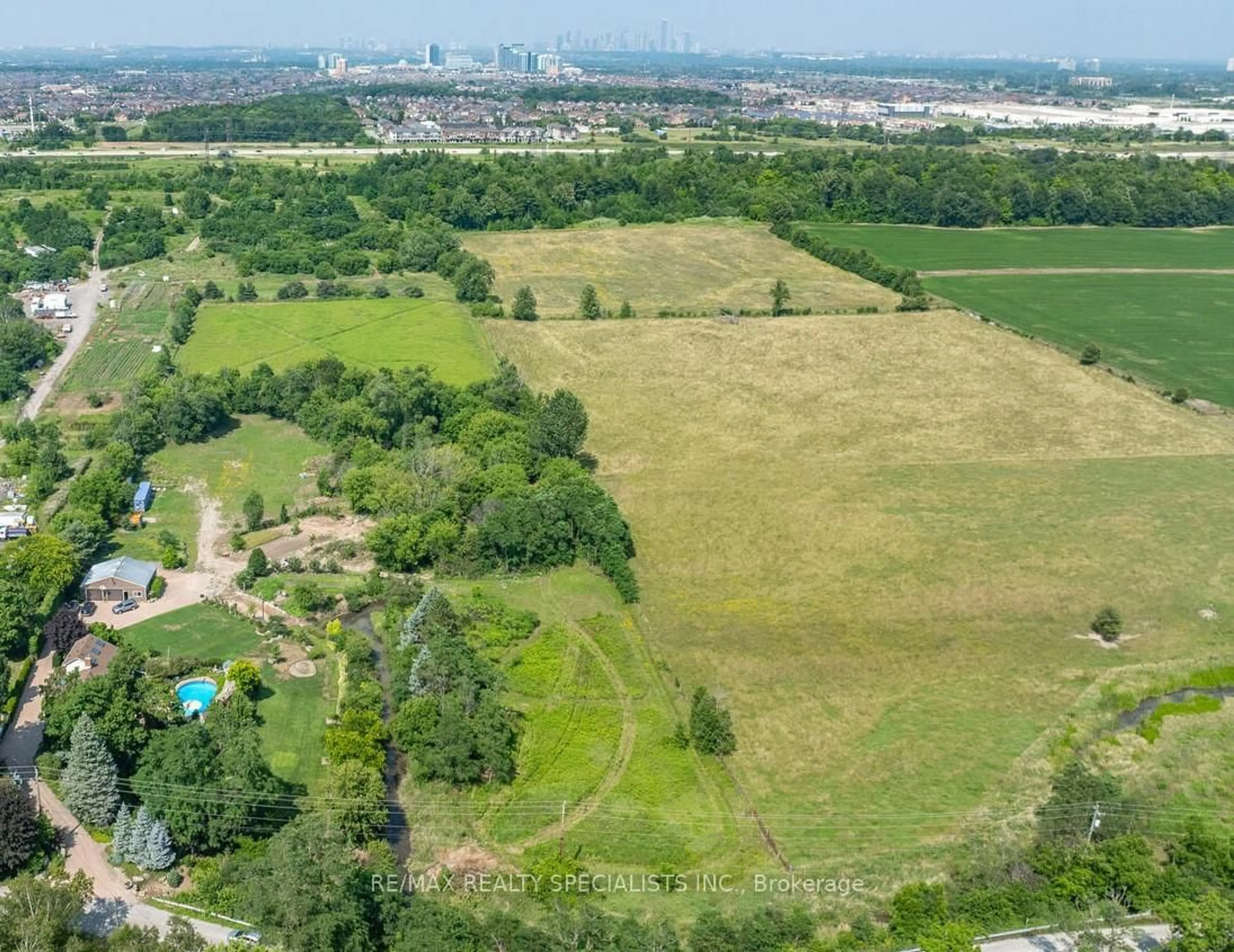 A pic from outside/outdoor area/front of a property/back of a property/a pic from drone, forest/trees view for 5189 Eighth Line, Milton Ontario L9E 1A3