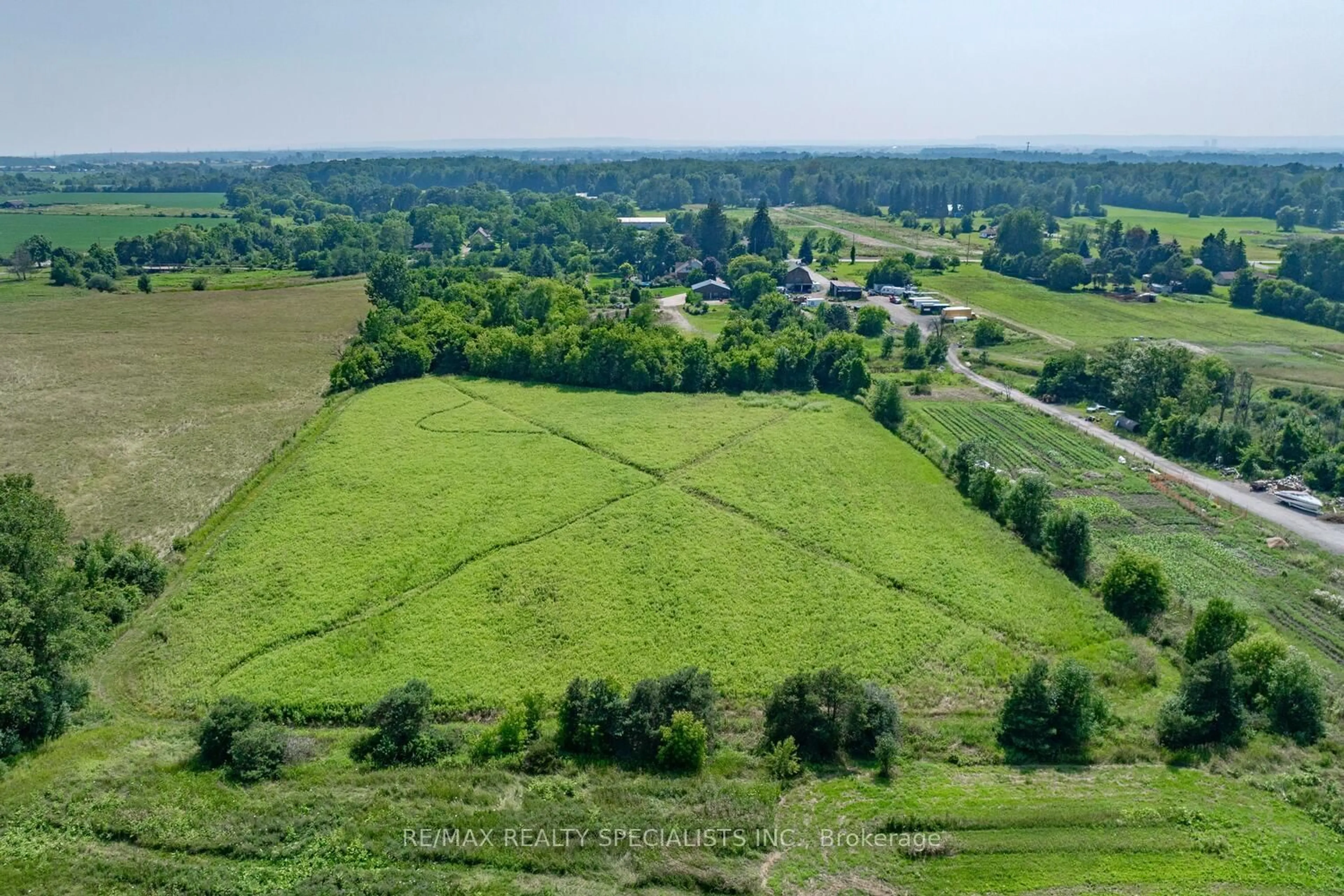 A pic from outside/outdoor area/front of a property/back of a property/a pic from drone, mountain view for 5189 Eighth Line, Milton Ontario L9E 1A3