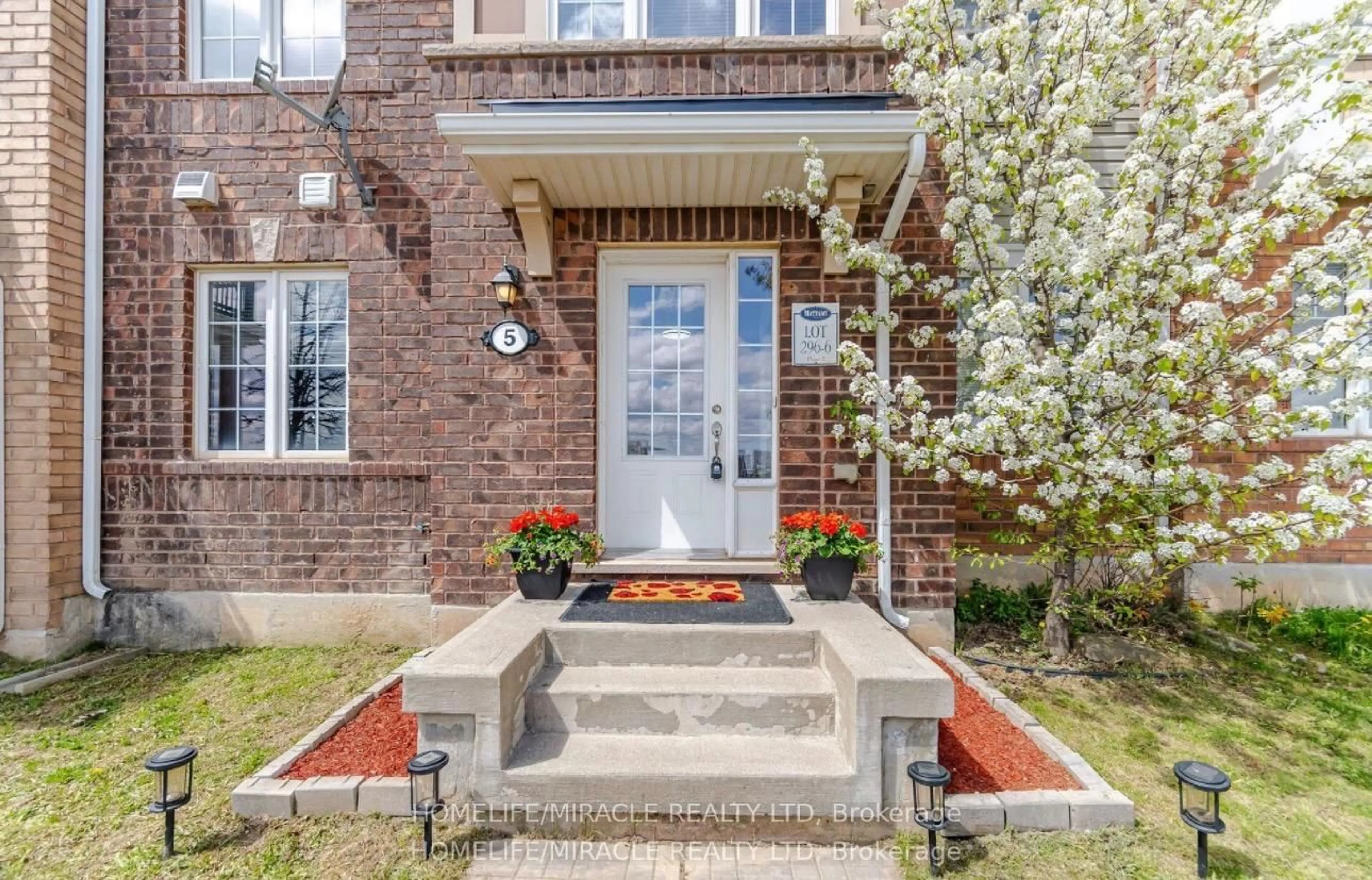 Home with brick exterior material, street for 5 Veterans Dr, Brampton Ontario L7A 0T8