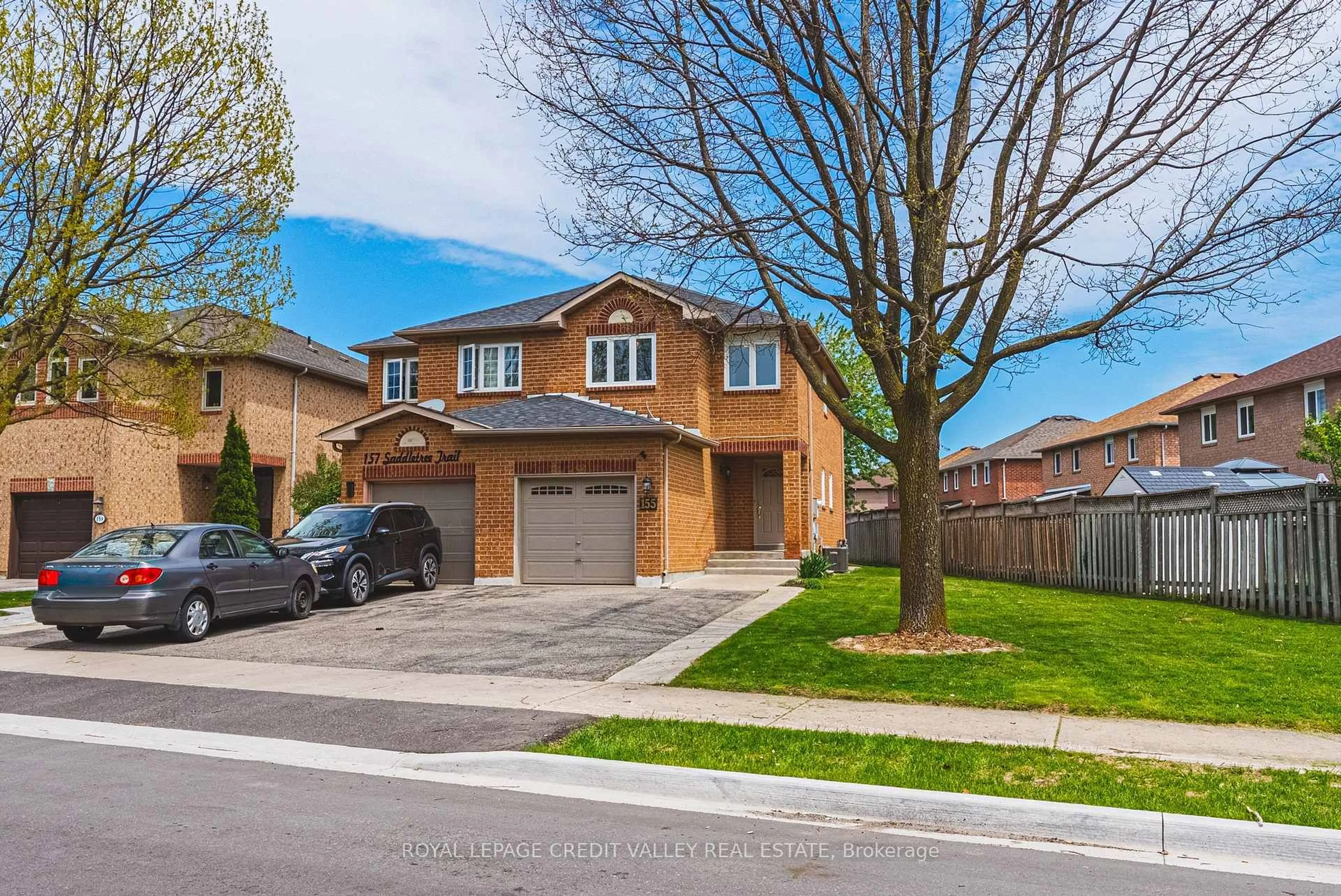 Home with brick exterior material, street for 155 Saddletree Tr, Brampton Ontario L6X 4M9