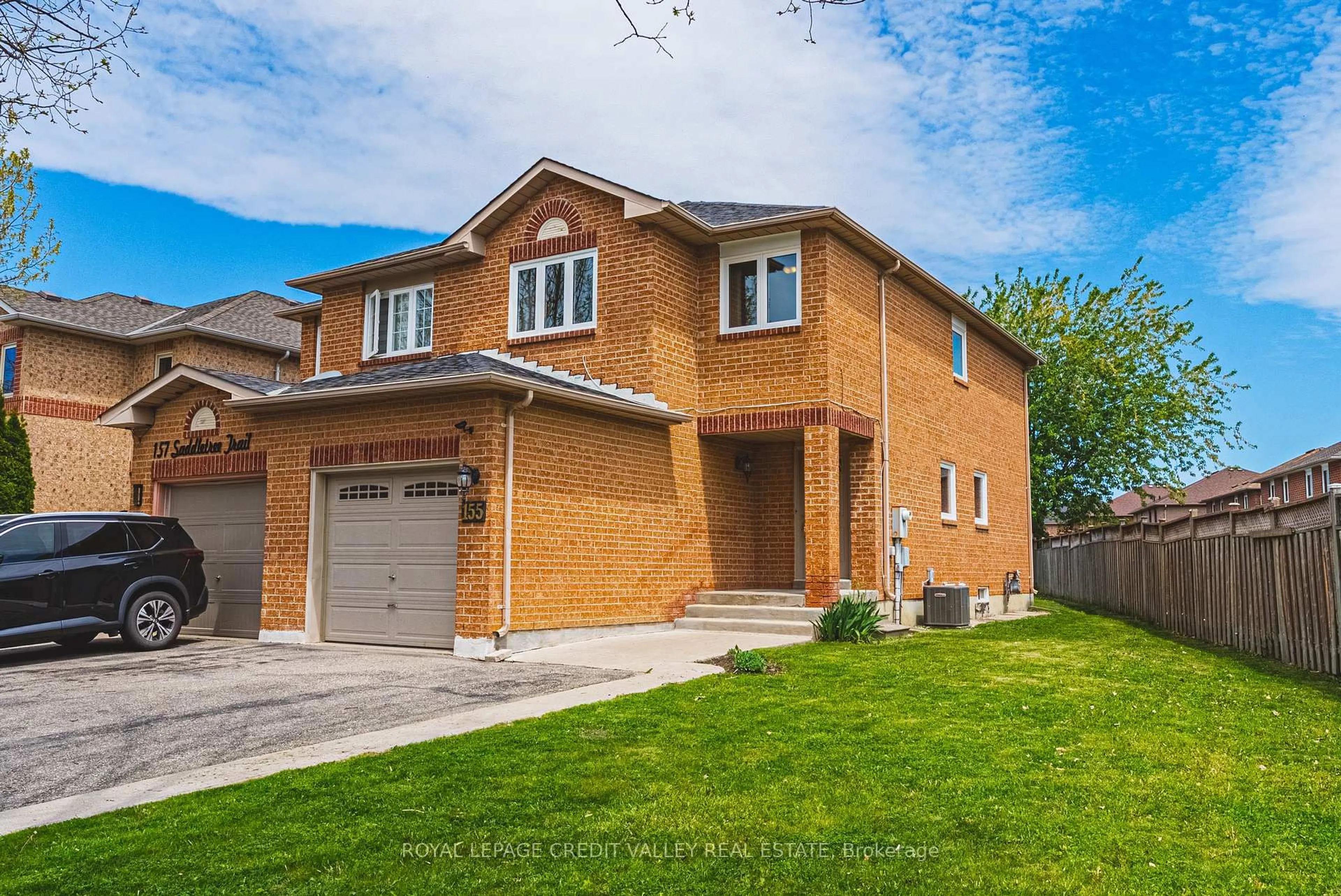 Home with brick exterior material, street for 155 Saddletree Tr, Brampton Ontario L6X 4M9