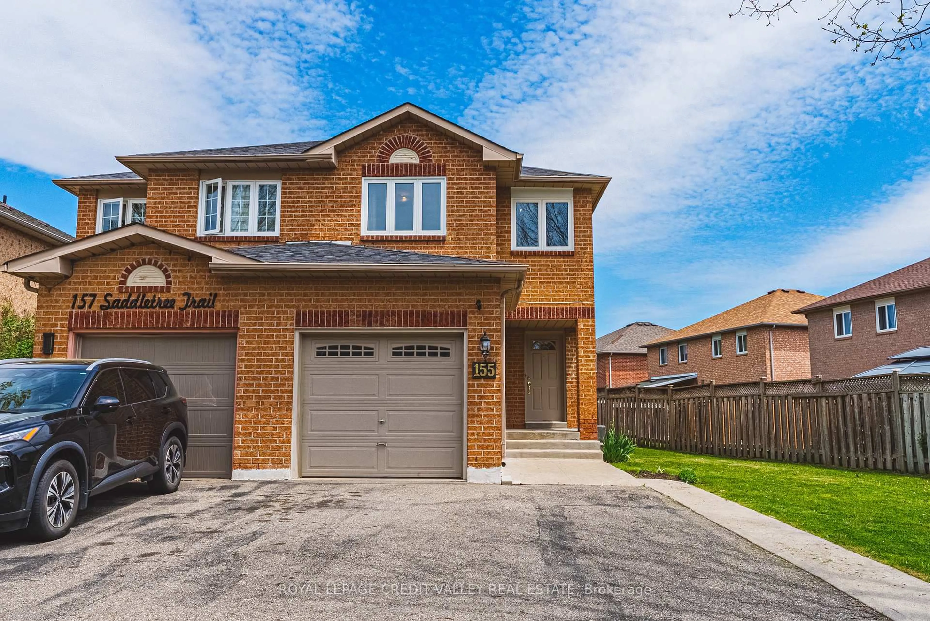 Home with brick exterior material, street for 155 Saddletree Tr, Brampton Ontario L6X 4M9