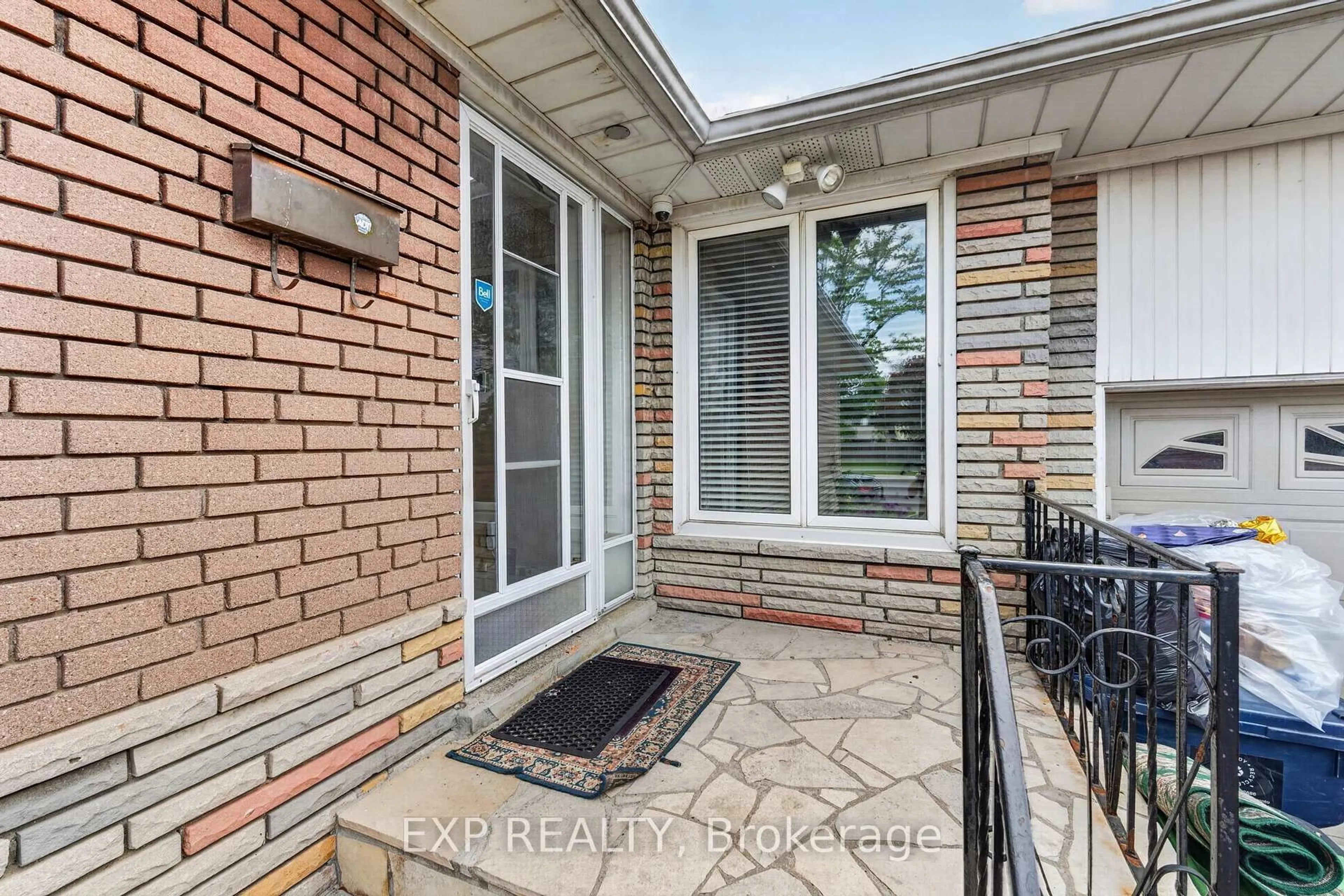 Home with brick exterior material, street for 64 Bridesburg Dr, Toronto Ontario M9R 2K8