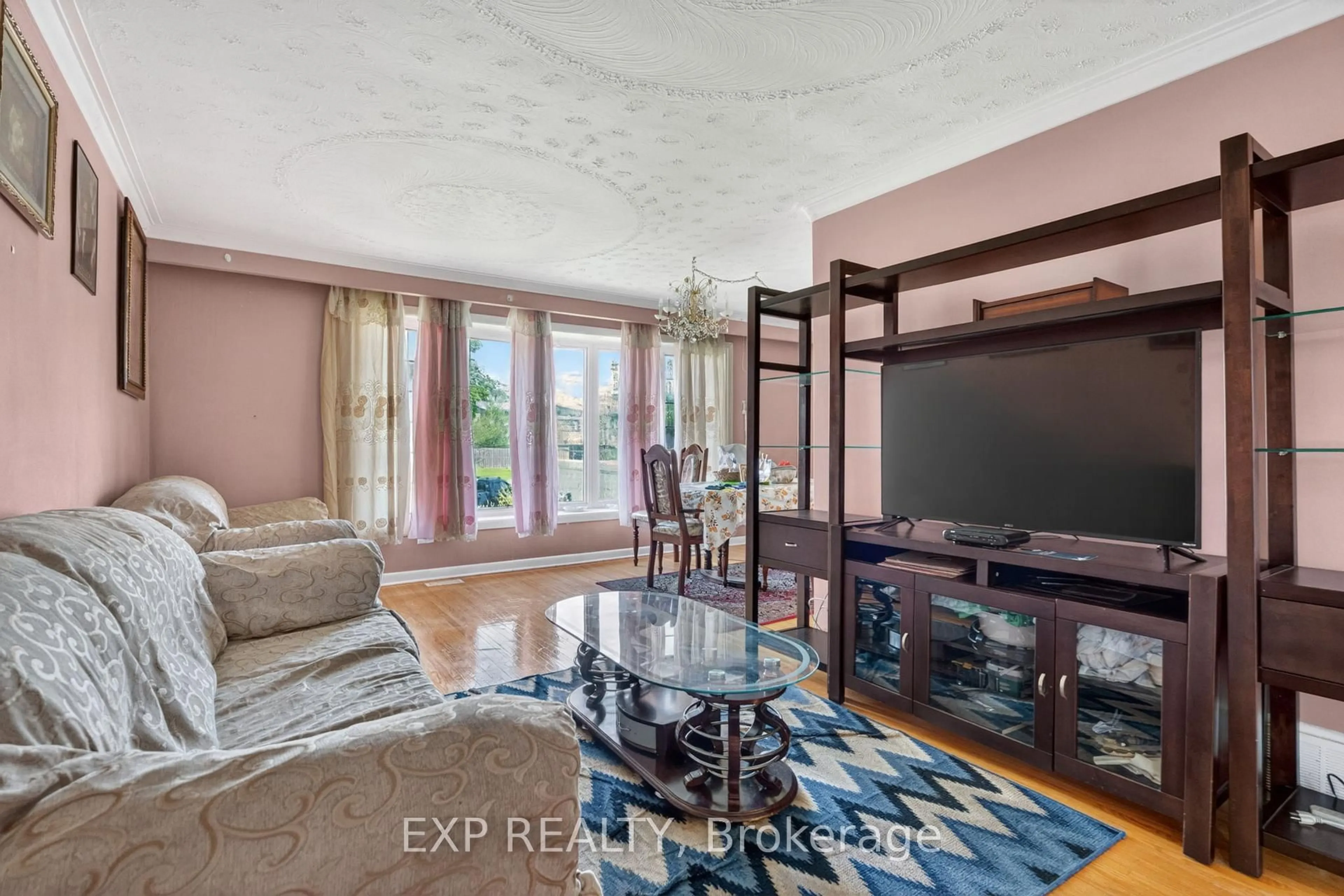 Living room with furniture, unknown for 64 Bridesburg Dr, Toronto Ontario M9R 2K8