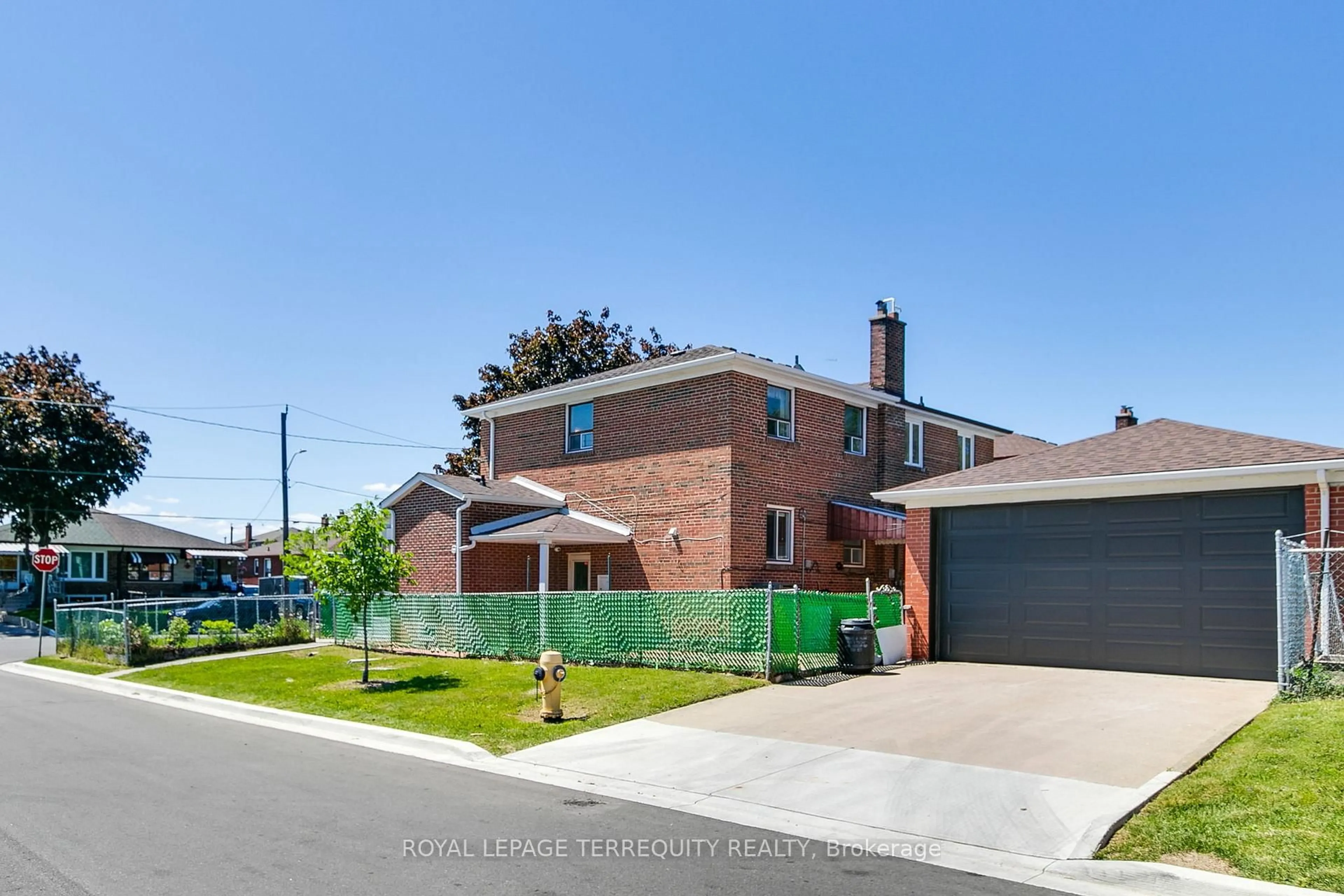 Home with brick exterior material, street for 57 Calico Dr, Toronto Ontario M3L 1V7