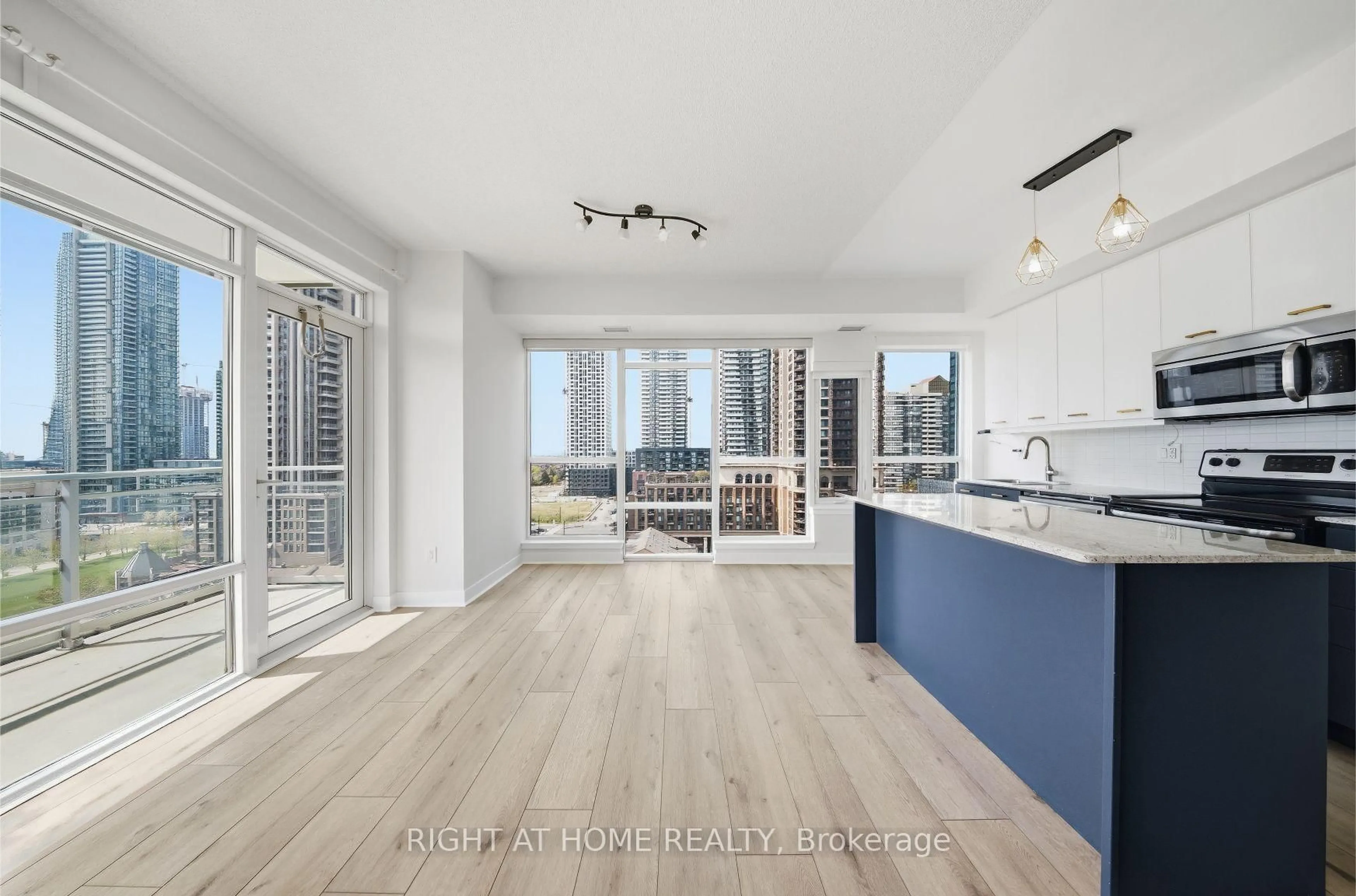 Open concept kitchen, wood/laminate floor for 365 Prince Of Wales Dr #1105, Mississauga Ontario L5B 0G6