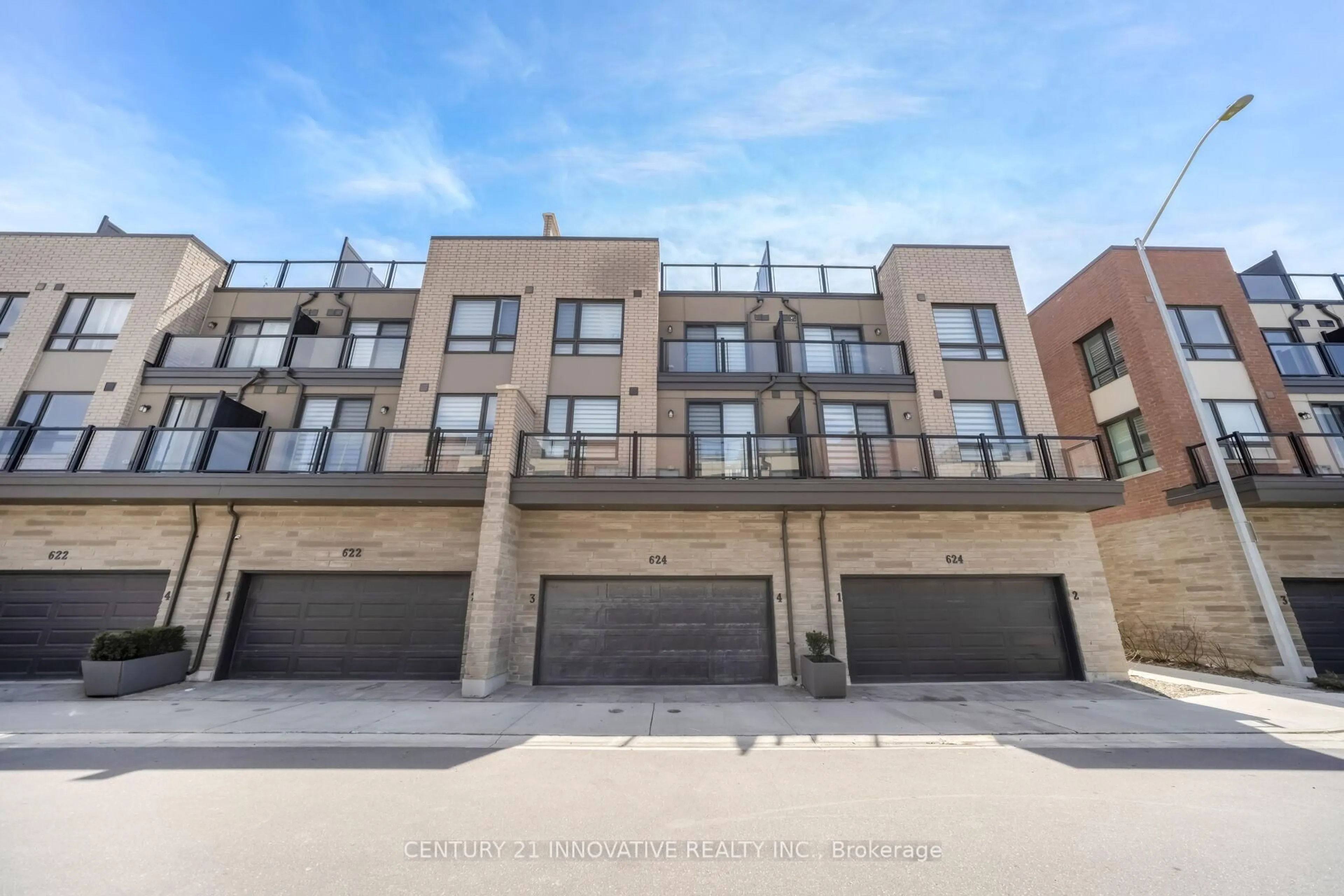 A pic from outside/outdoor area/front of a property/back of a property/a pic from drone, street for 624 Rexdale Blvd #4, Toronto Ontario M9W 0G1