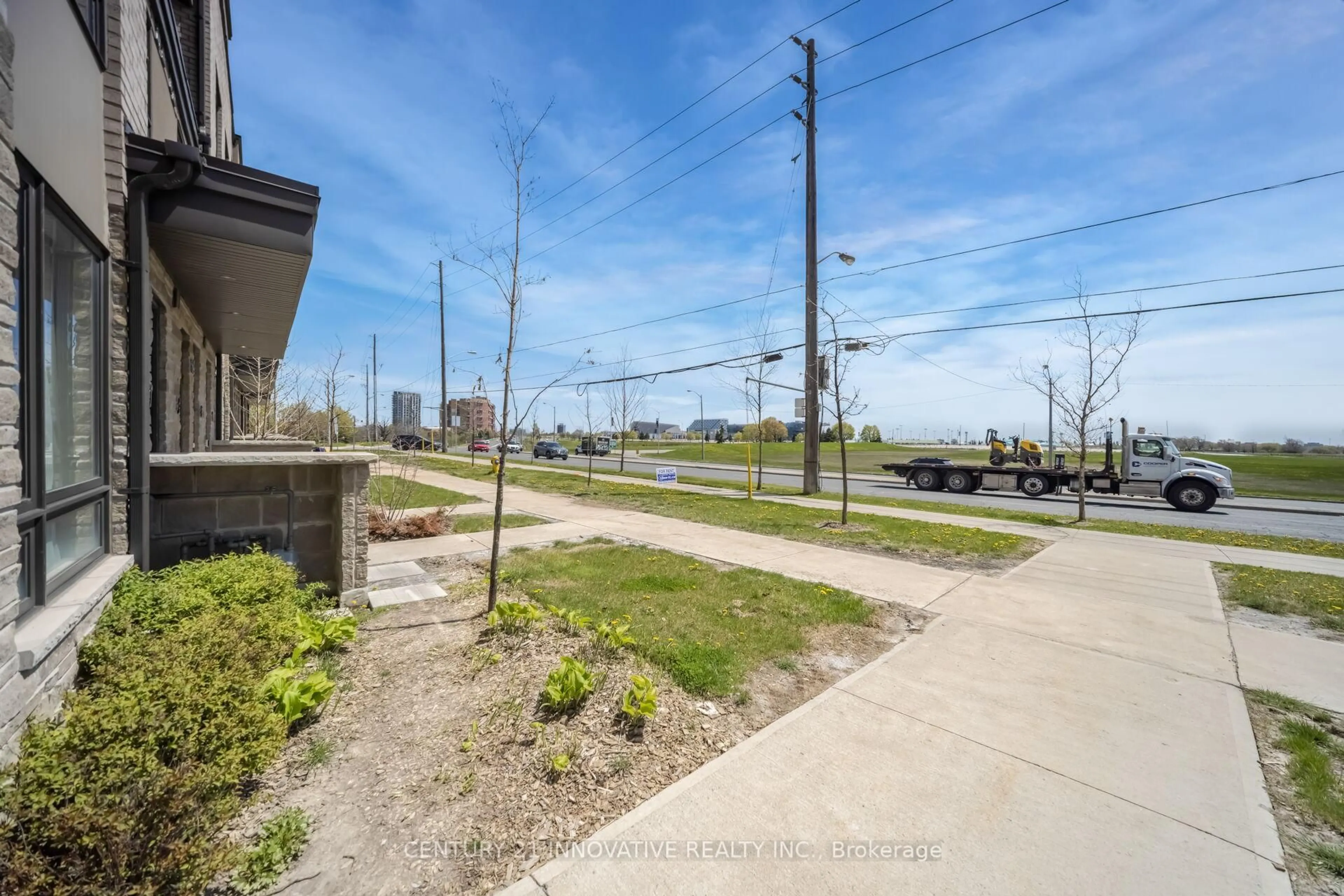 A pic from outside/outdoor area/front of a property/back of a property/a pic from drone, street for 624 Rexdale Blvd #4, Toronto Ontario M9W 0G1