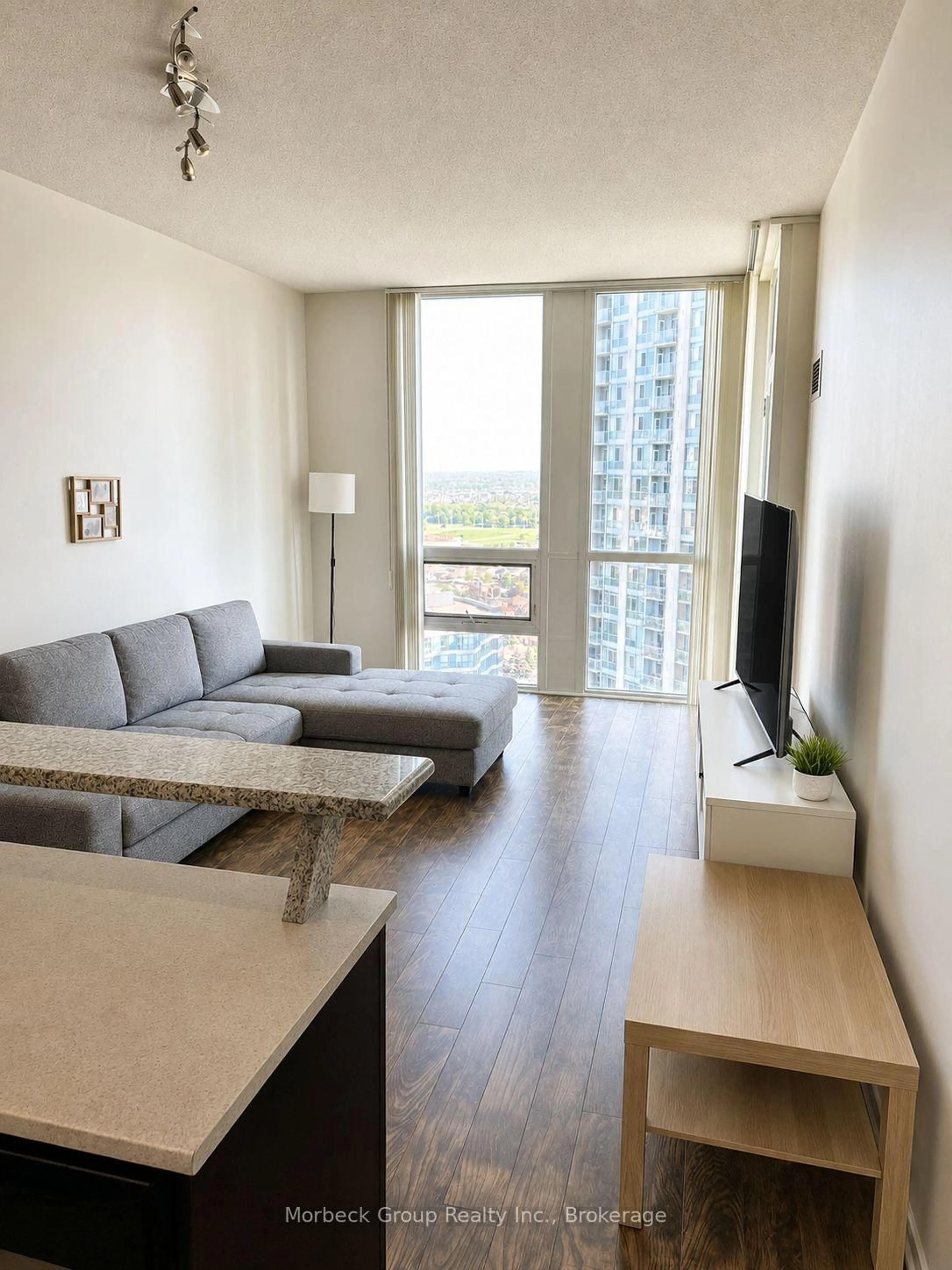 Living room with furniture, unknown for 220 Burnhamthorpe Rd #2406, Mississauga Ontario L5B 3Y5