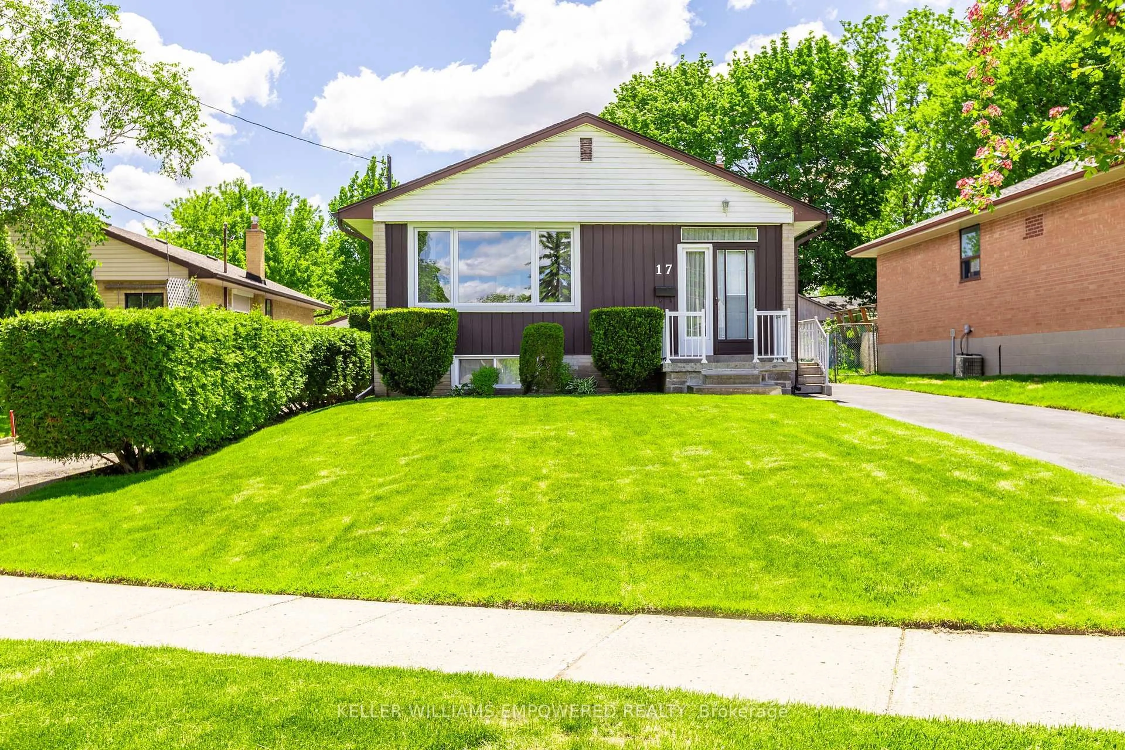 Home with vinyl exterior material, street for 17 Checkendon Dr, Toronto Ontario M9W 2Y8