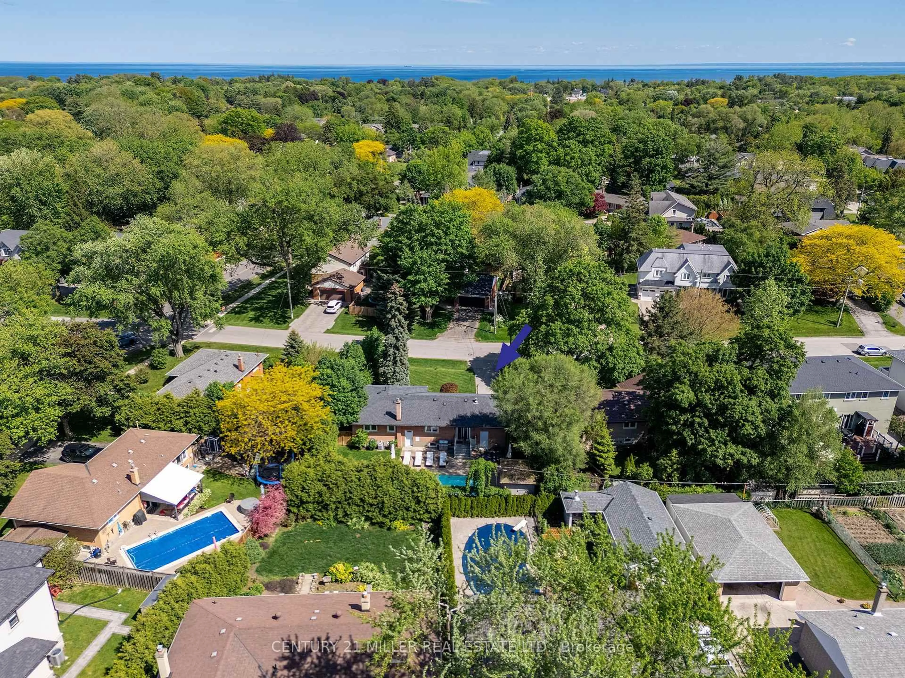 A pic from outside/outdoor area/front of a property/back of a property/a pic from drone, water/lake/river/ocean view for 1171 Tisdale St, Oakville Ontario L6L 2S9