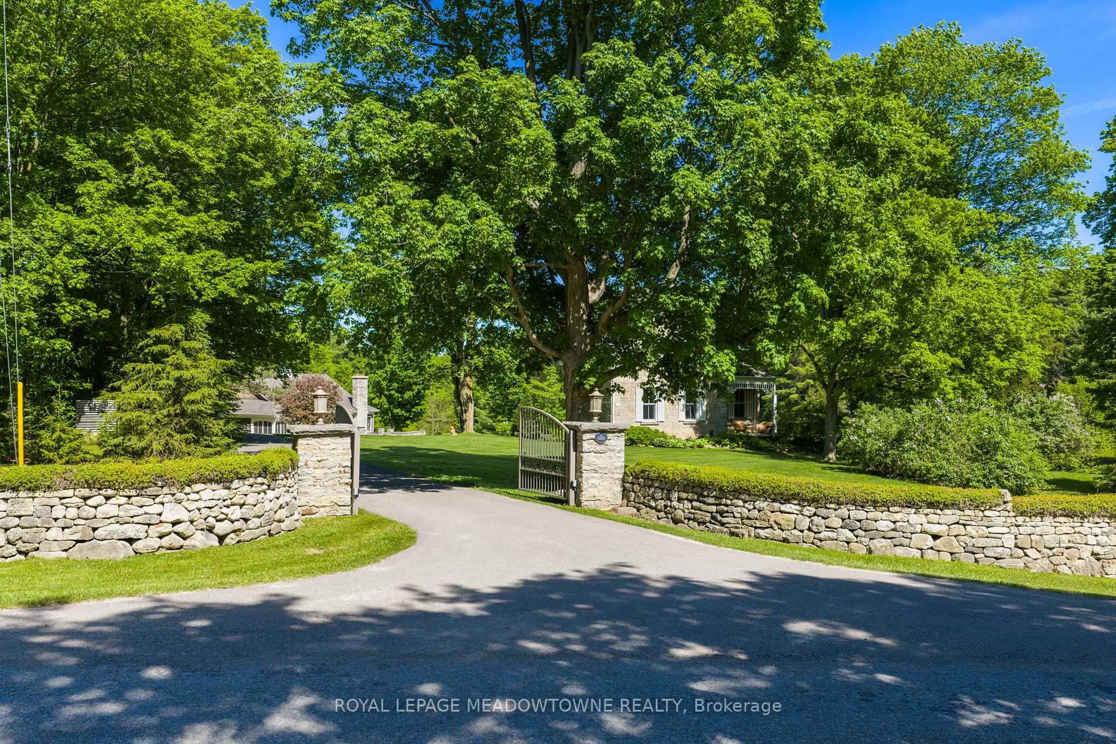 A pic from outside/outdoor area/front of a property/back of a property/a pic from drone, unknown for 14249 Tenth Line, Halton Hills Ontario L7G 4S8