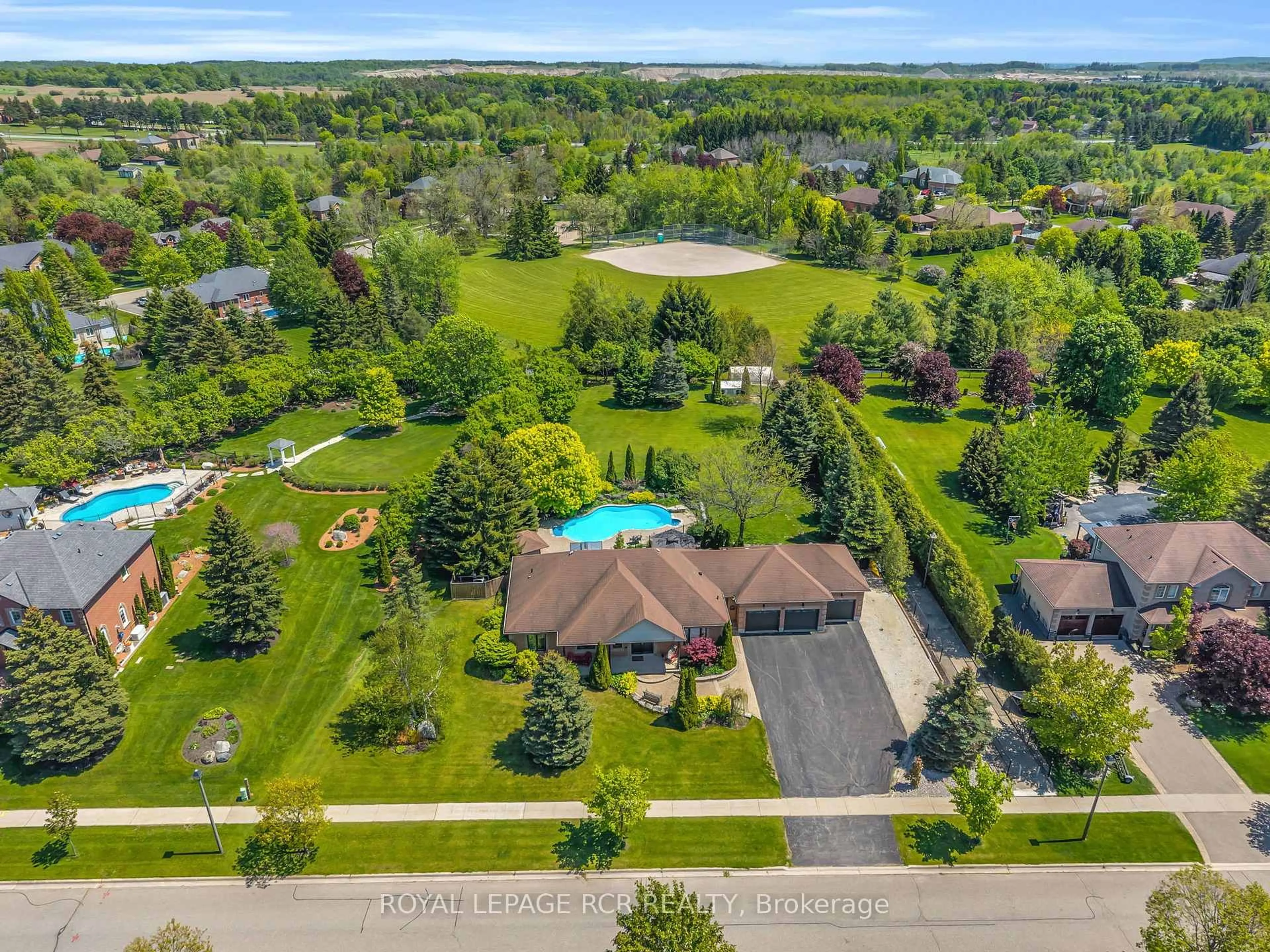 A pic from outside/outdoor area/front of a property/back of a property/a pic from drone, water/lake/river/ocean view for 5 Massari St, Caledon Ontario L7K 0B6