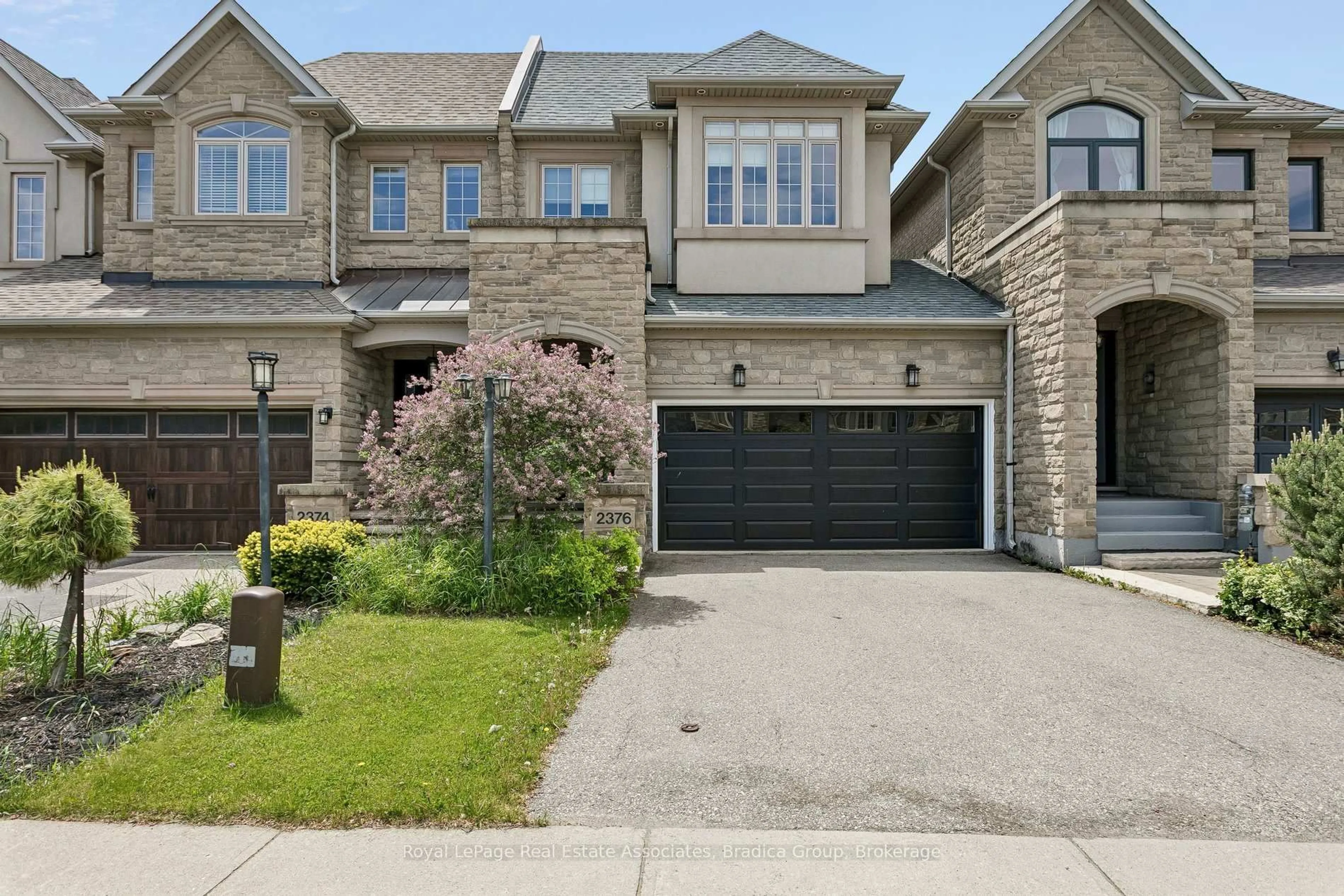 Home with brick exterior material, street for 2376 Wasaga Dr, Oakville Ontario L6H 0B7