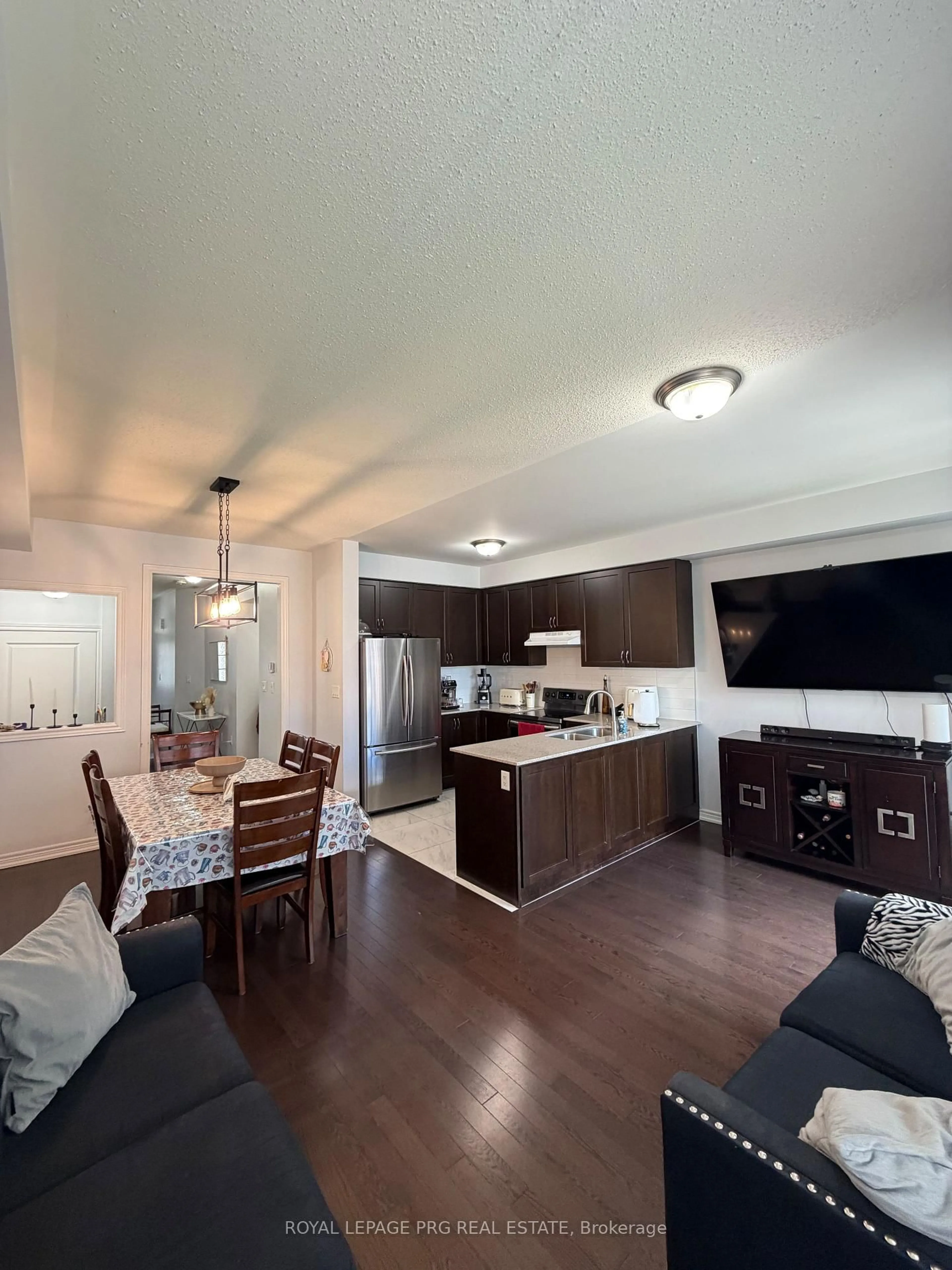 Open concept kitchen, wood/laminate floor for 57 True Blue Cres, Caledon Ontario L7E 4K7