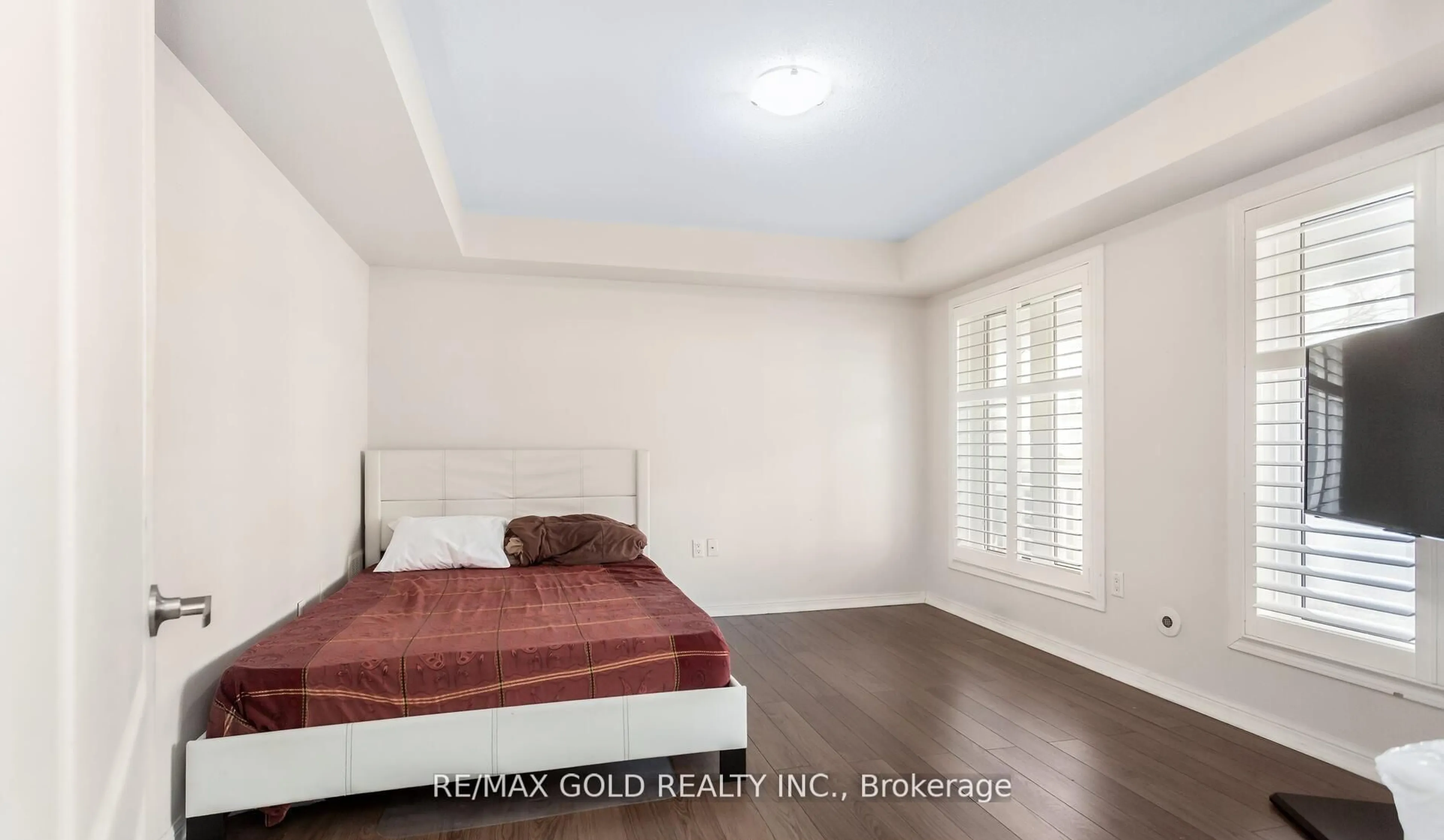 Bedroom with bed, wood/laminate floor for 644 Scott Blvd, Milton Ontario L9T 0P2