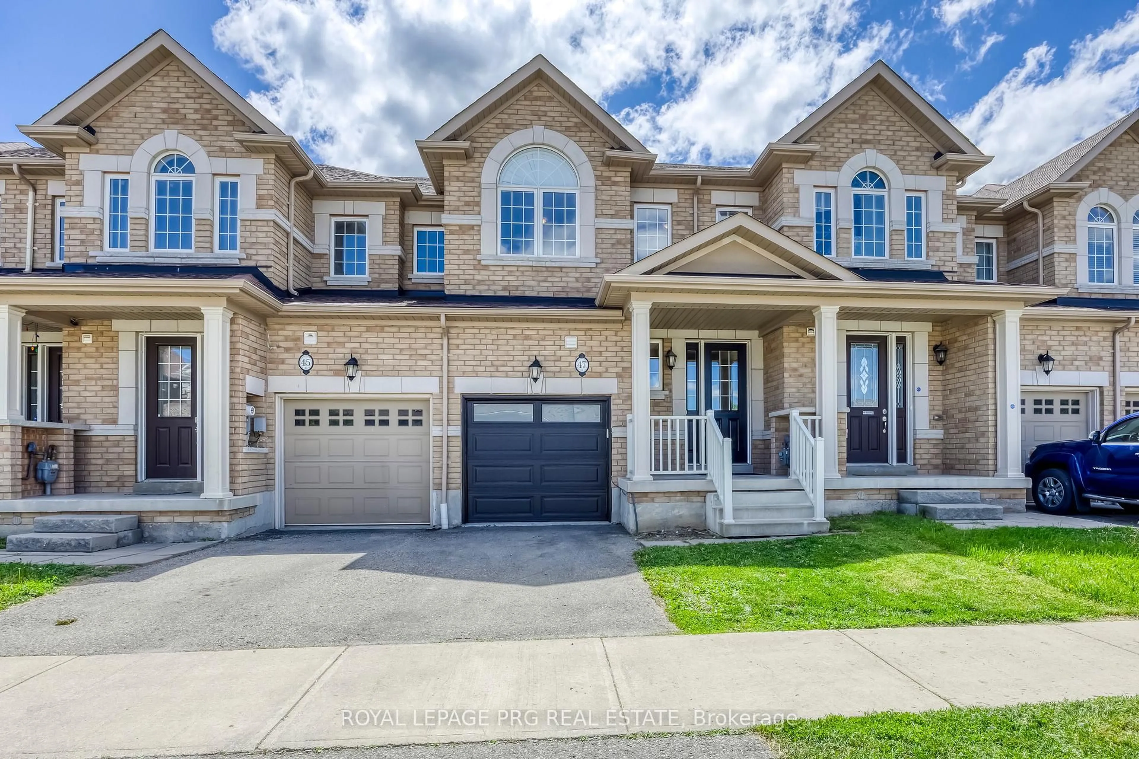 Home with brick exterior material, street for 47 Dufay Rd, Brampton Ontario L7A 4A2