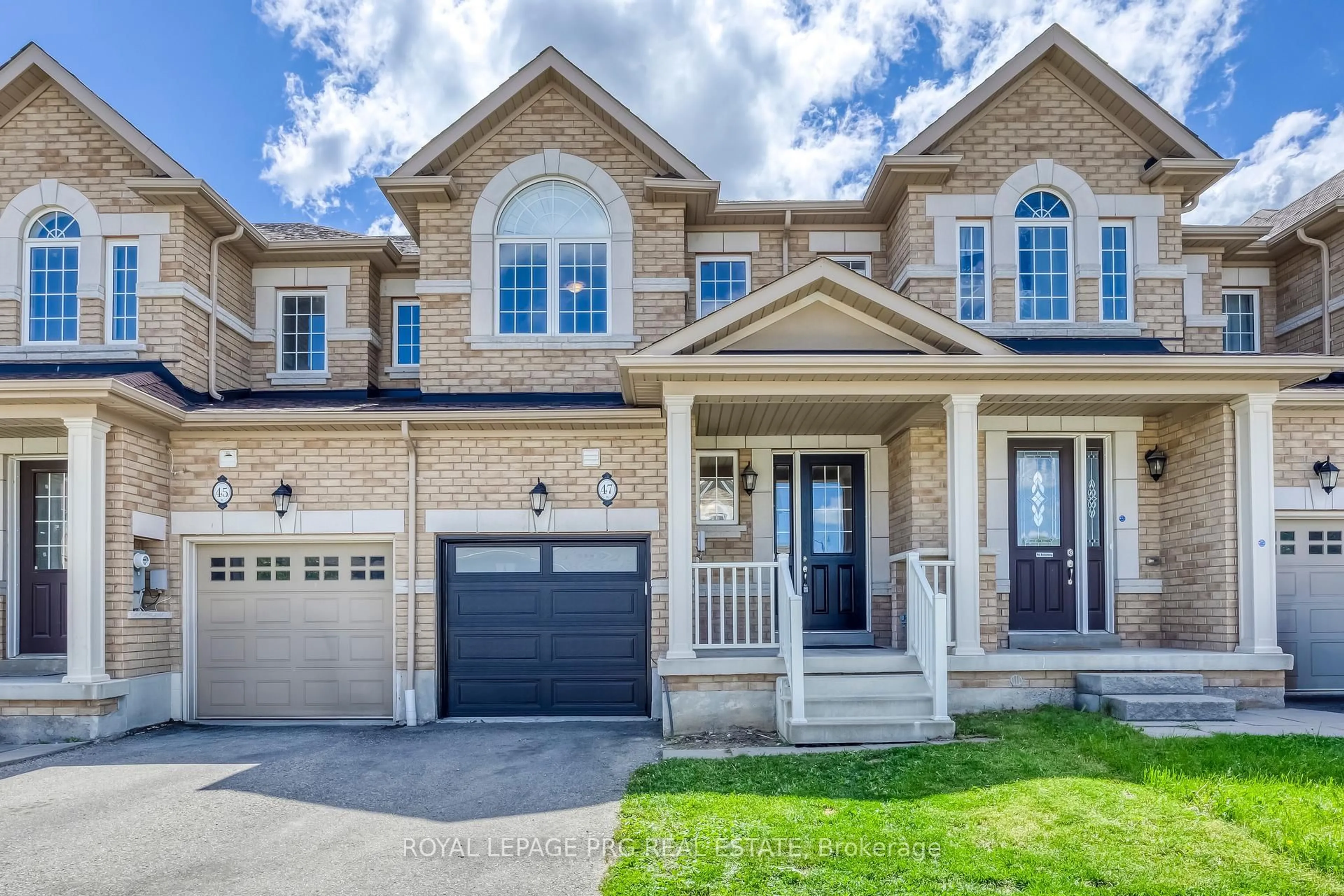 Home with brick exterior material, street for 47 Dufay Rd, Brampton Ontario L7A 4A2