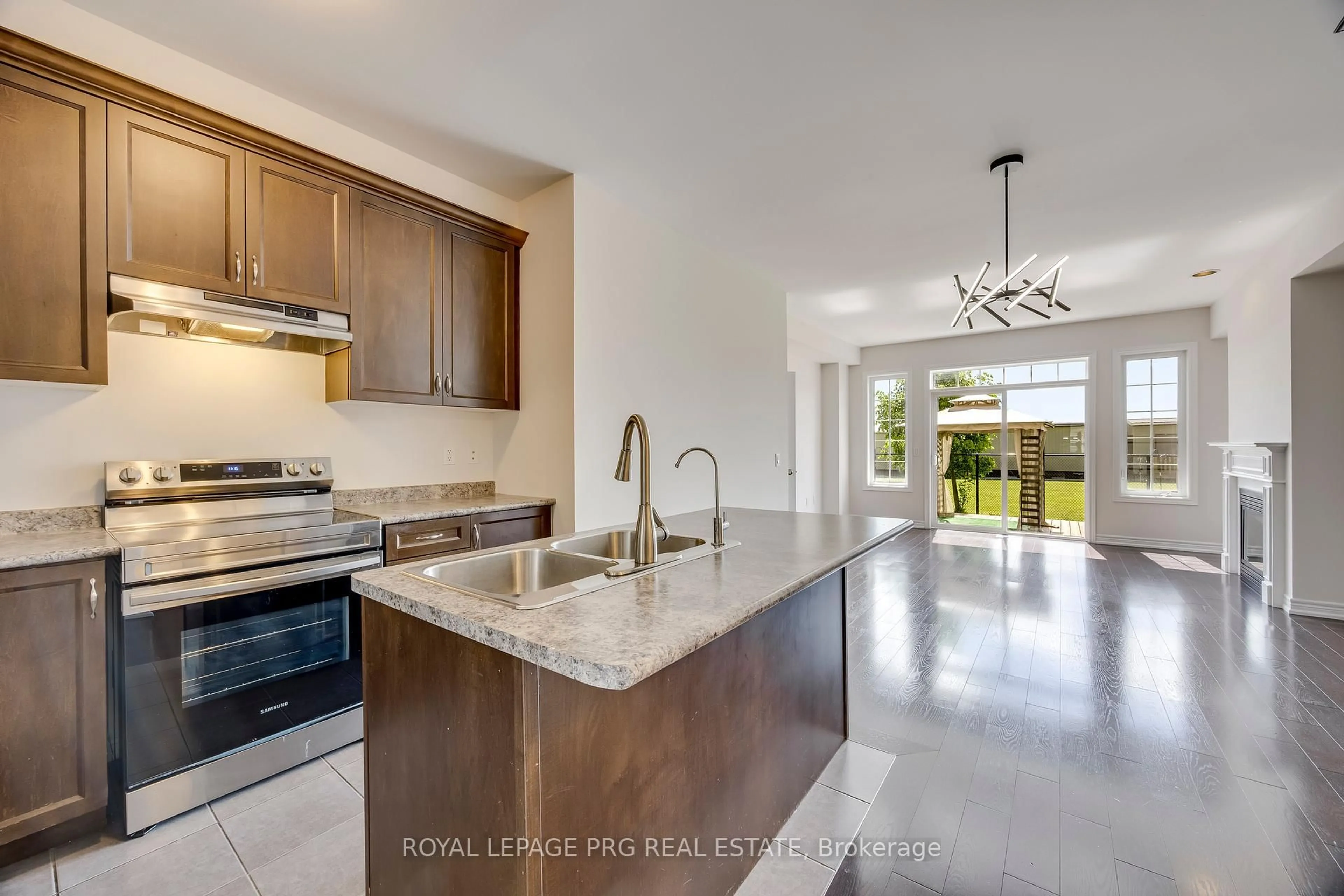 Open concept kitchen, ceramic/tile floor for 47 Dufay Rd, Brampton Ontario L7A 4A2