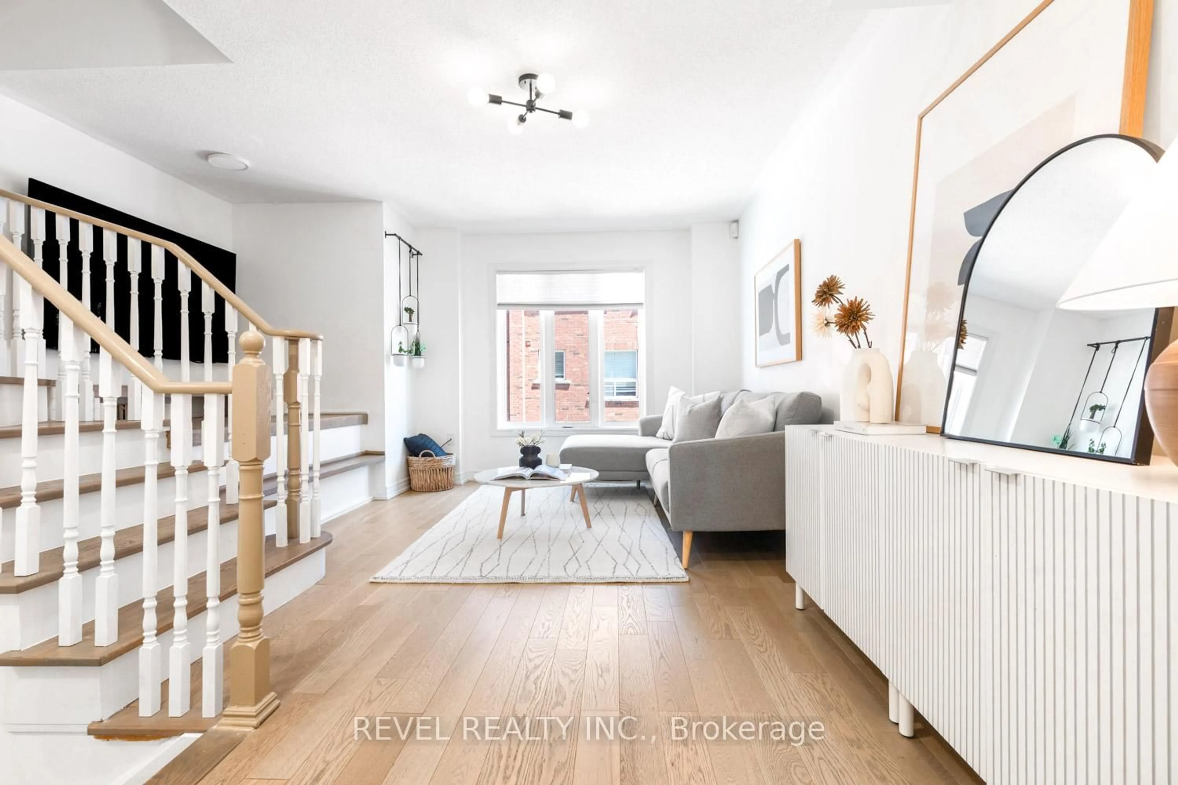 Living room with furniture, wood/laminate floor for 8 Grogan Mews, Toronto Ontario M6H 4J9