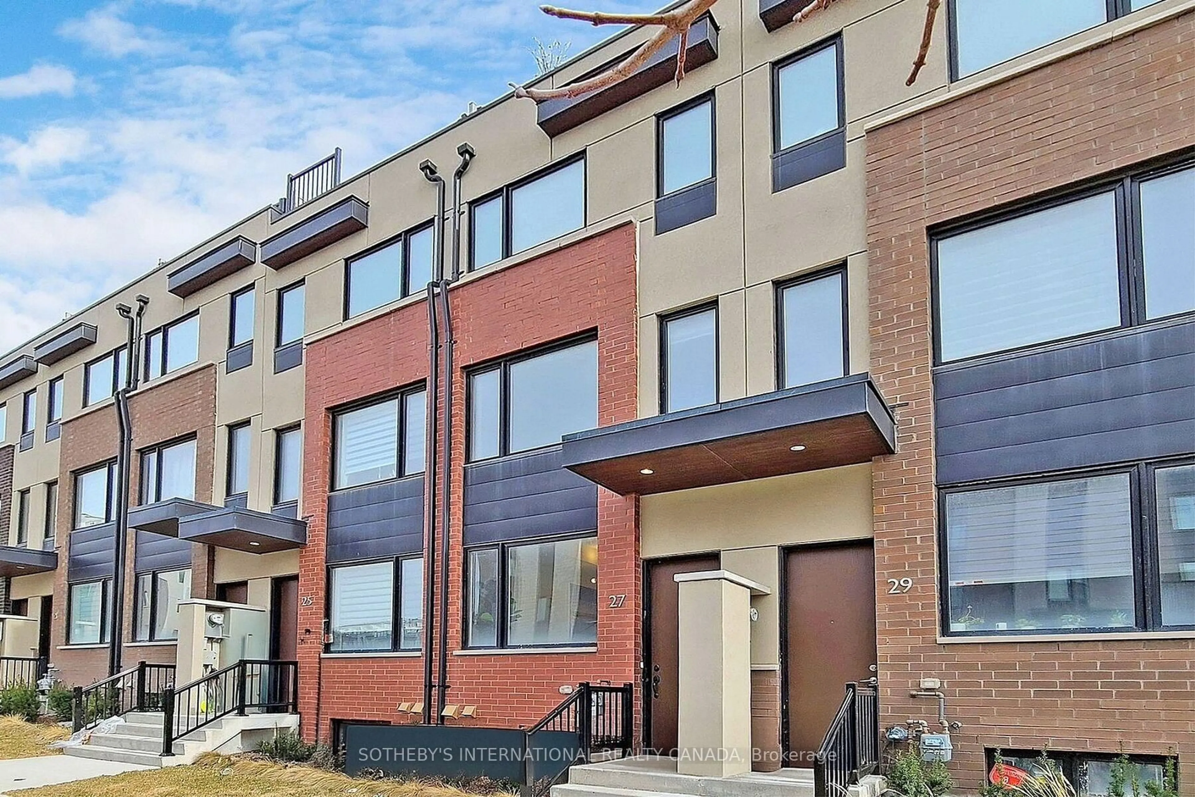 Home with brick exterior material, street for 27 Thomas Mulholland Dr, Toronto Ontario M3K 0A8
